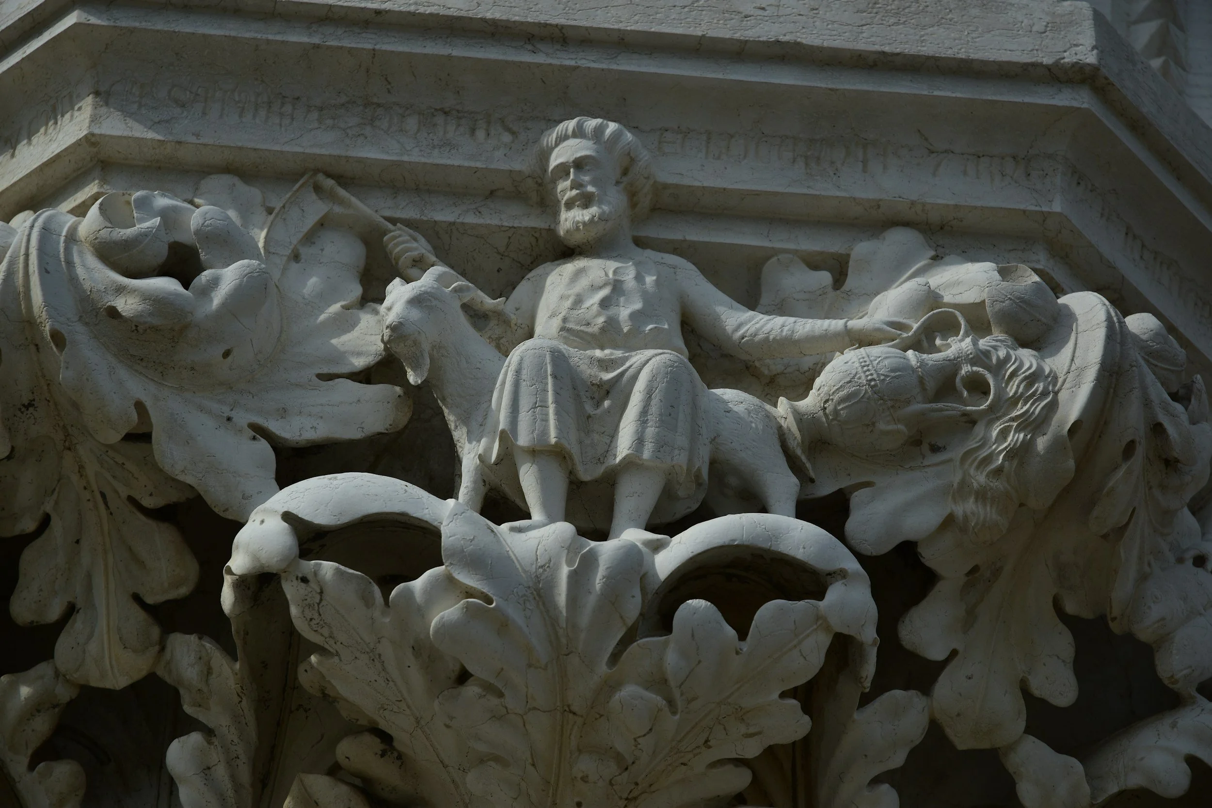 Close up showing detail on a hand-crafted stone carving.