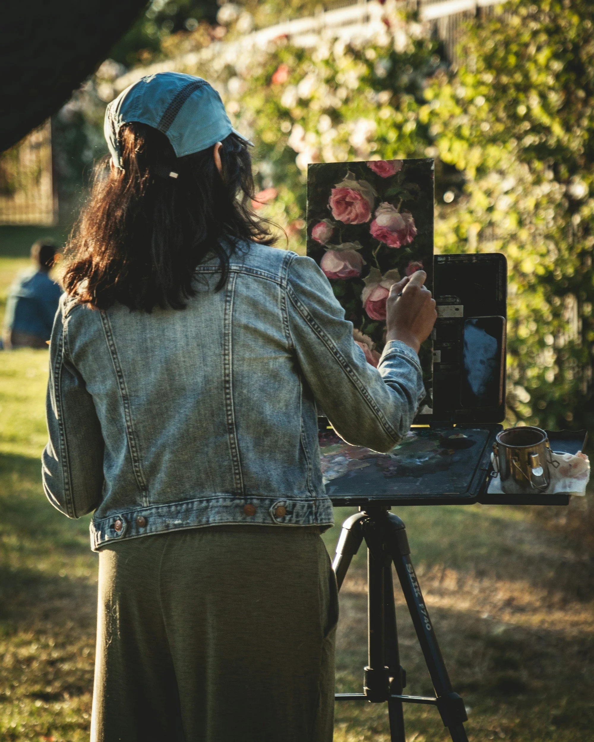Woman painting in plein air.