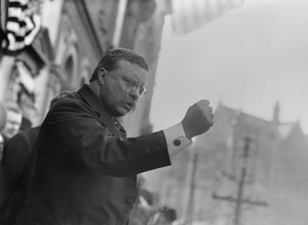 Theodore Roosevelt making a speech.