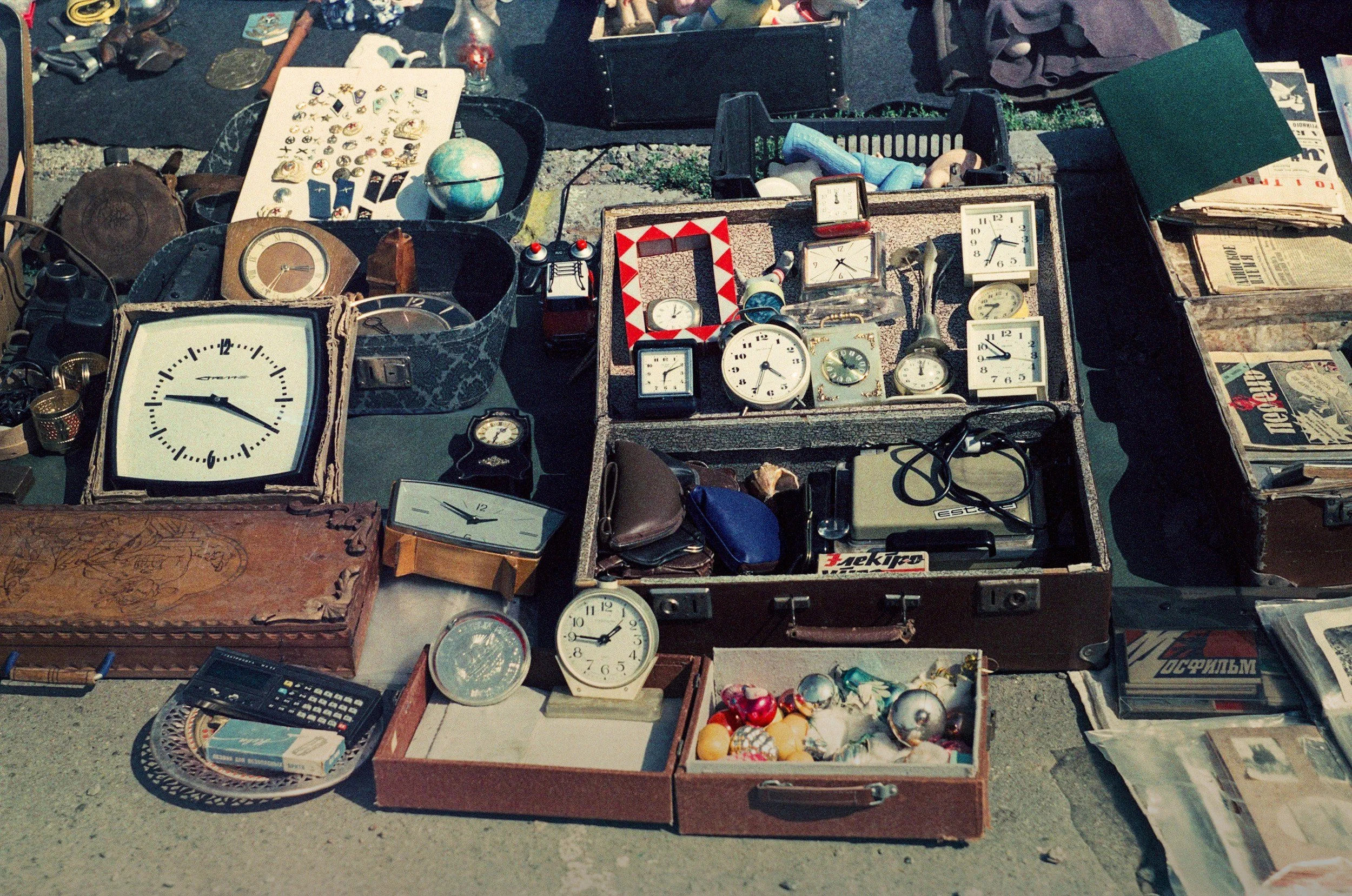 Vintage clocks and other items for sale at an Adirondack garage sale.