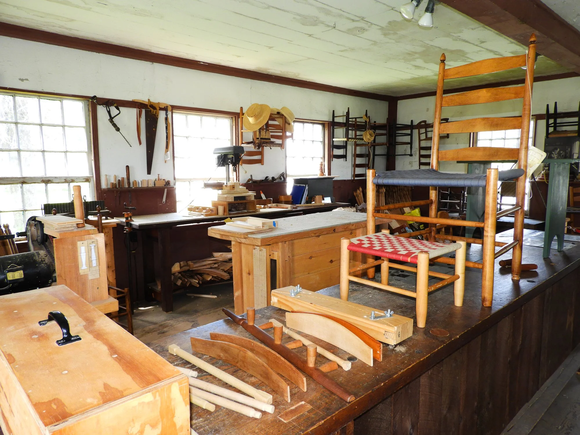 Shaker furniture workroom with typical shaker tools and implements.