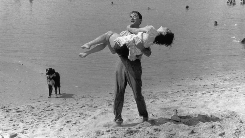 Gregory Peck and Ava Gardner in the classic movie On The Beach playing at the Strand in Schroon Lake.