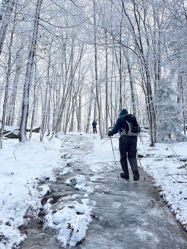 Hikers on the Goodnow Mountain trail in winter.
