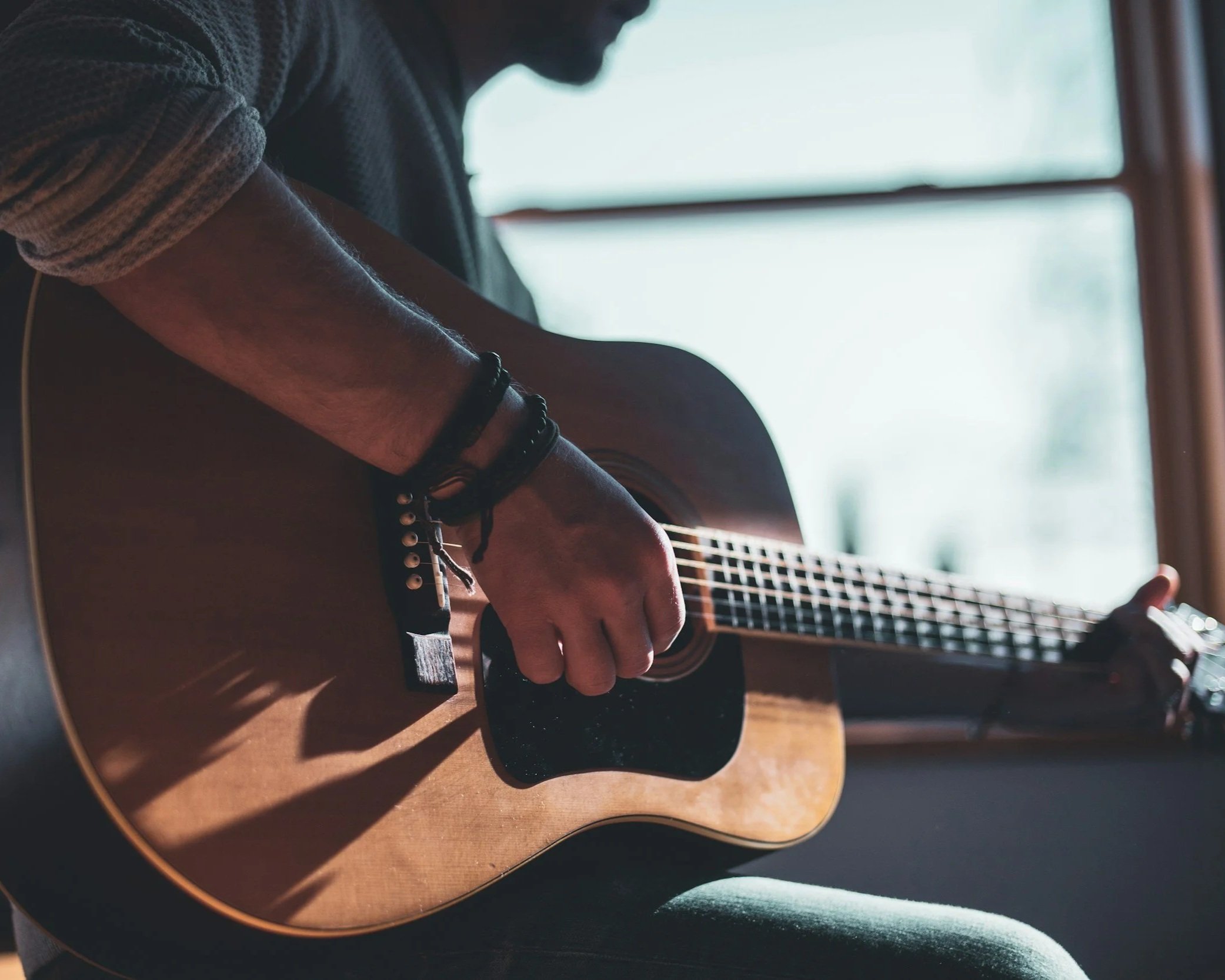 Guitarist playing live in Schroon Lake during PorchFest.
