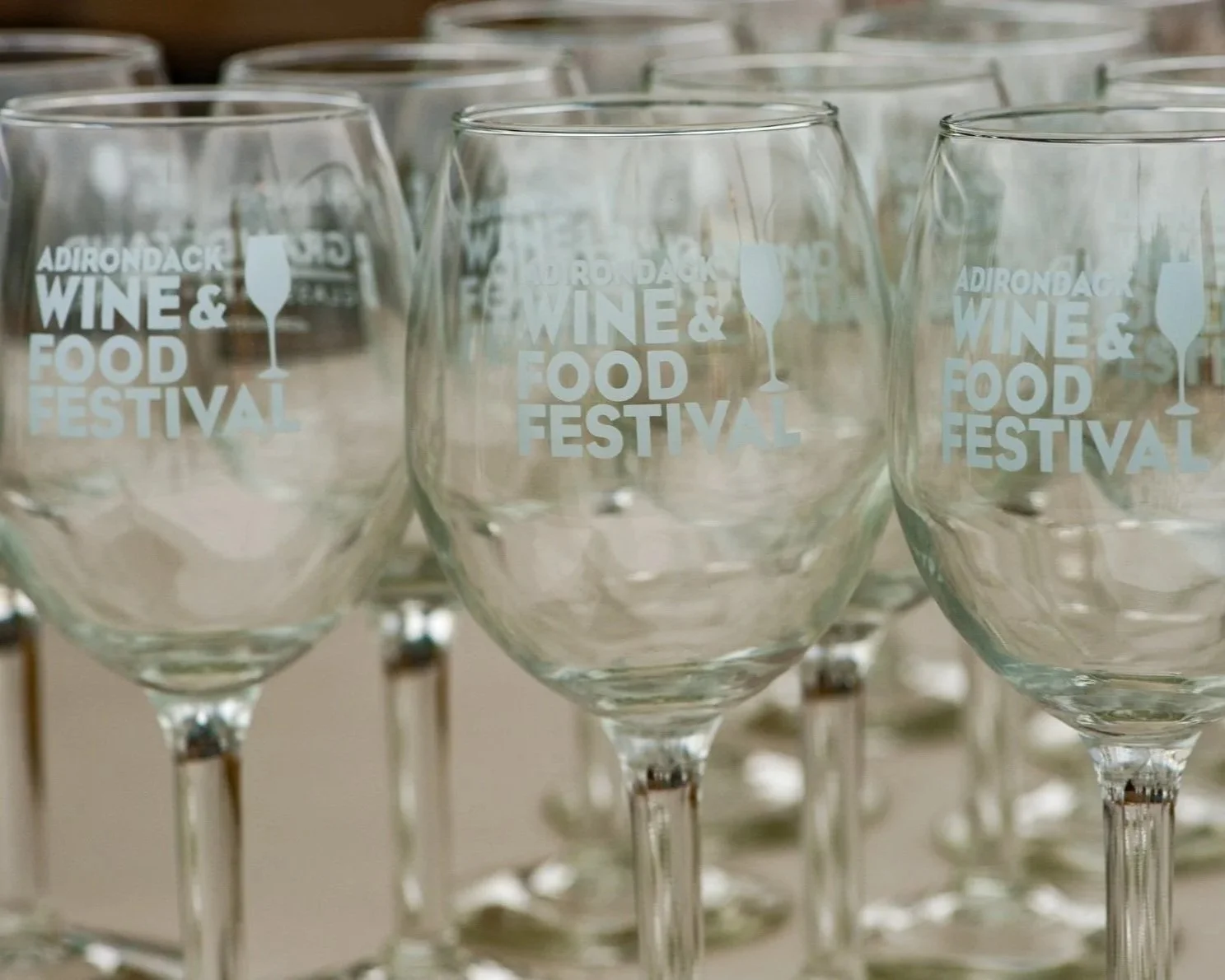 Wine glasses lined up for the Adirondack Food and Wine Festival in Lake George Village.