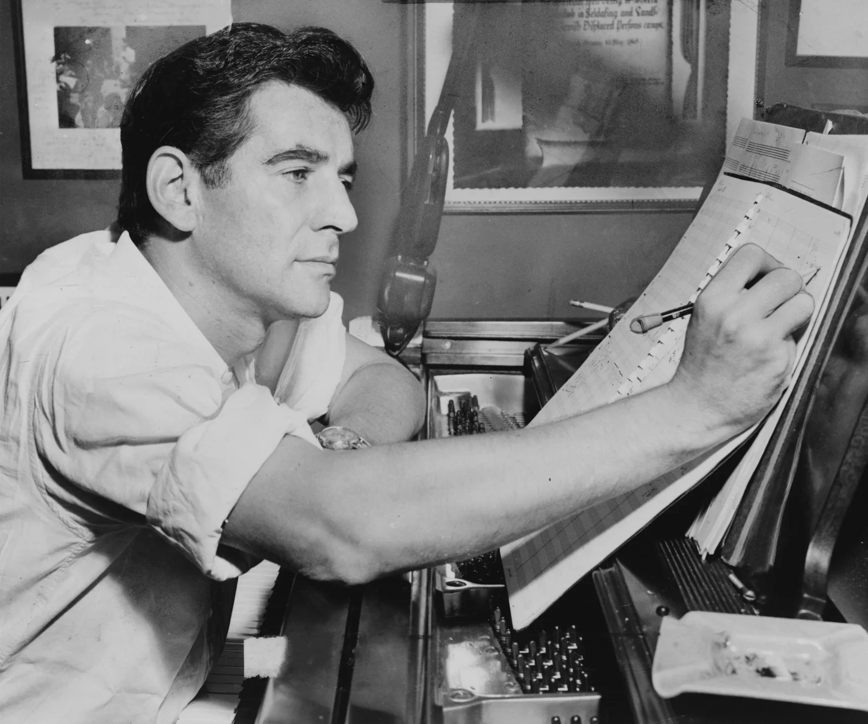 Leonard Bernstein composing music.