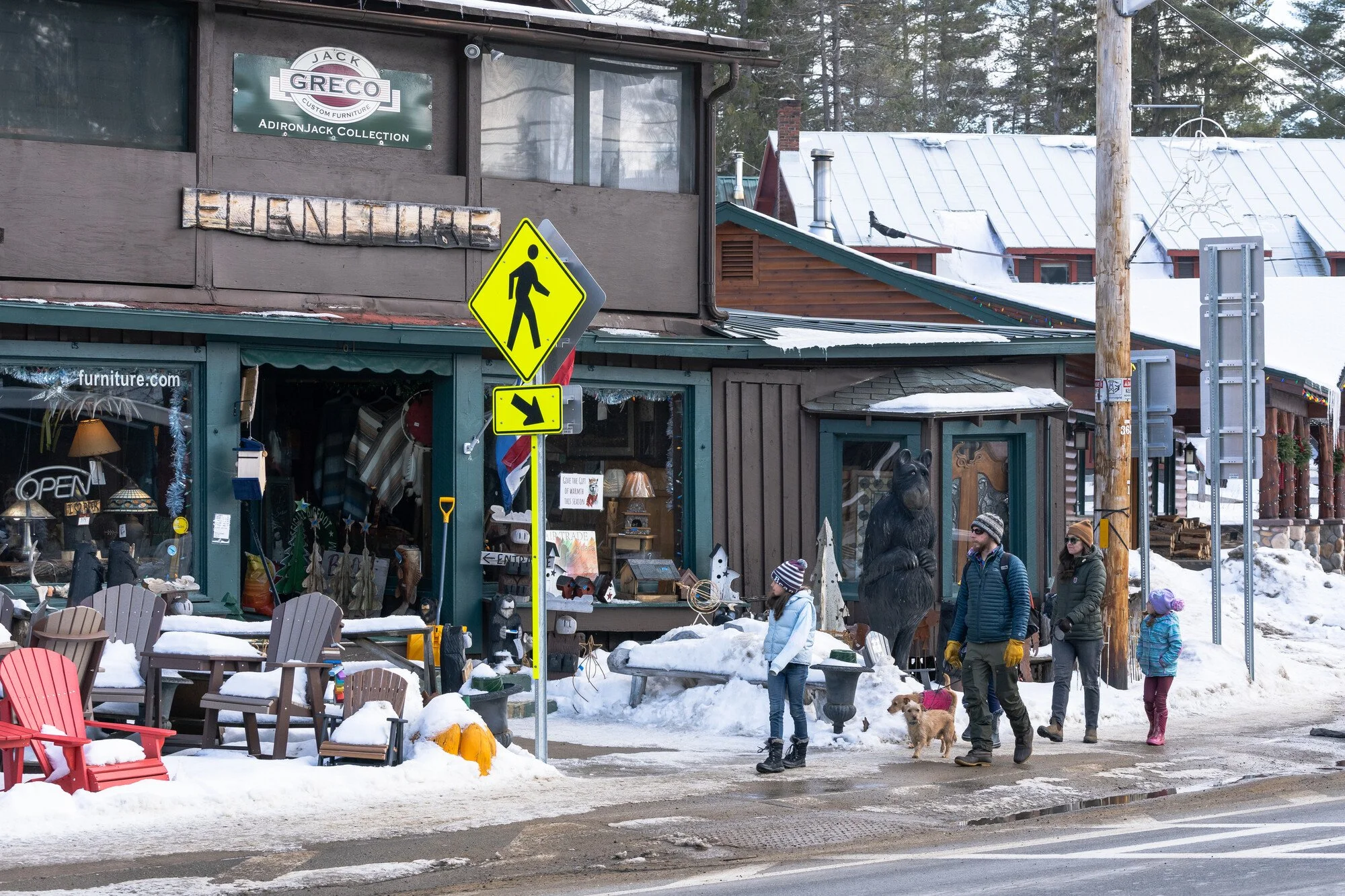 Family shopping on Main Street in Inlet New York.