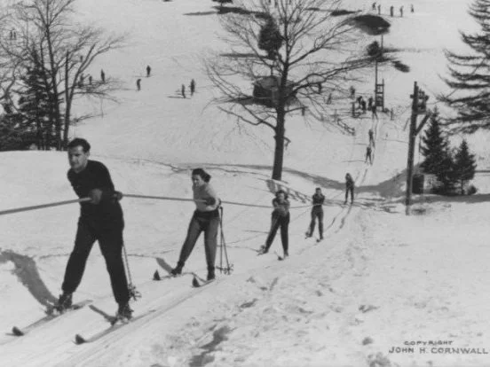 Vintage photo of the original rope tow at North Creek Ski Bowl in the Adirondacks.