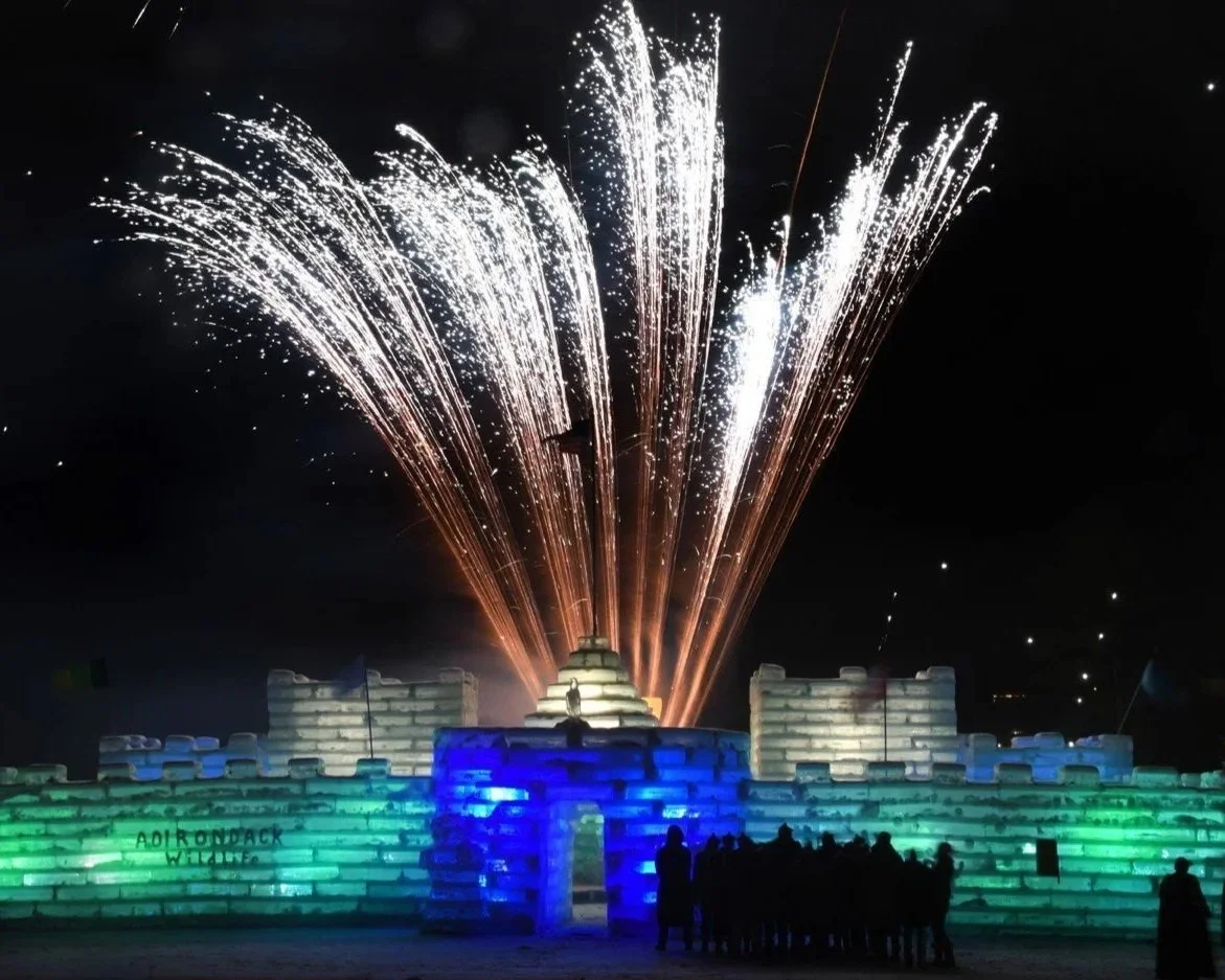 Saranac Lake Winter Carnival Ice Palace and fireworks.
