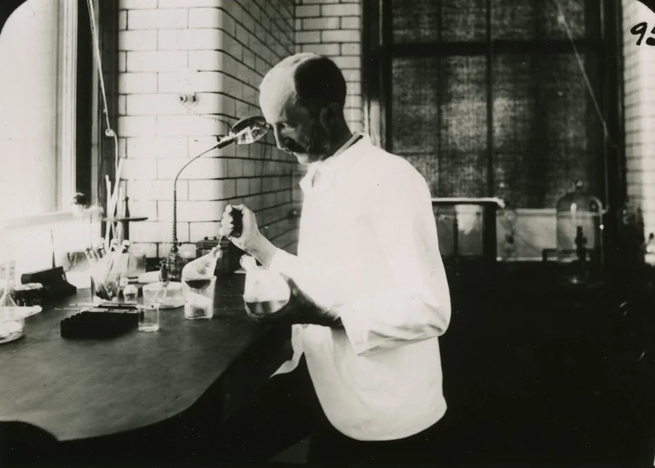 Dr. Edward Livingston Trudeau in hs laboratory researching tuberculosis in saranac lake, NY.