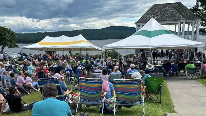 People gathered in Town Park in Schroon Lake for the Adirondack Folk Festival.