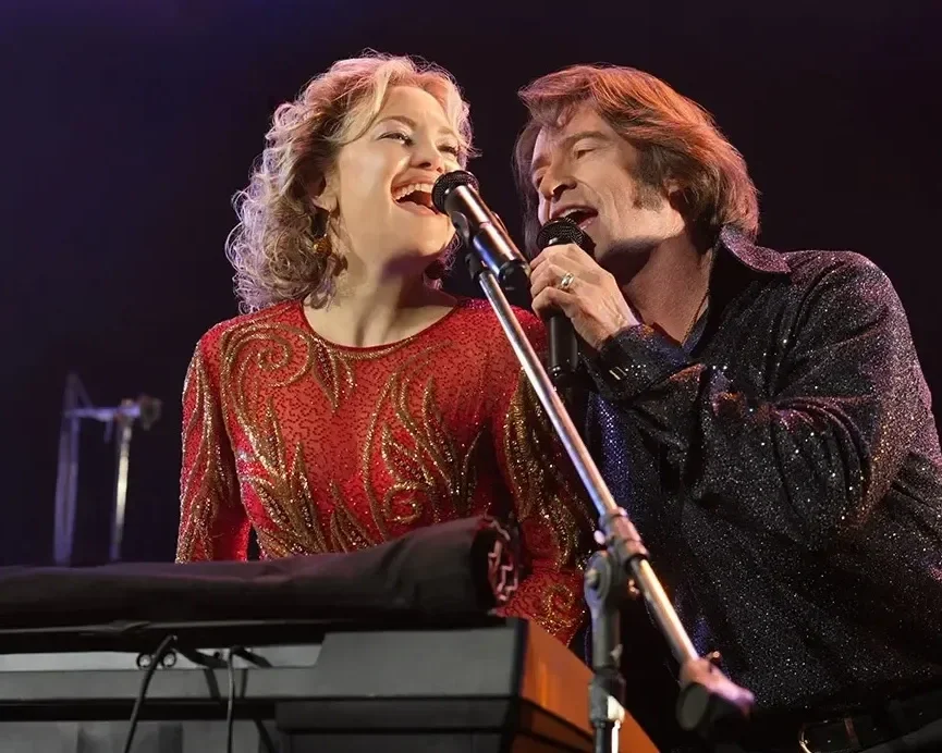 Kate Hudson and Hugh Jackman in the movie Song Sung Blue about Neil Diamond Tribute Band