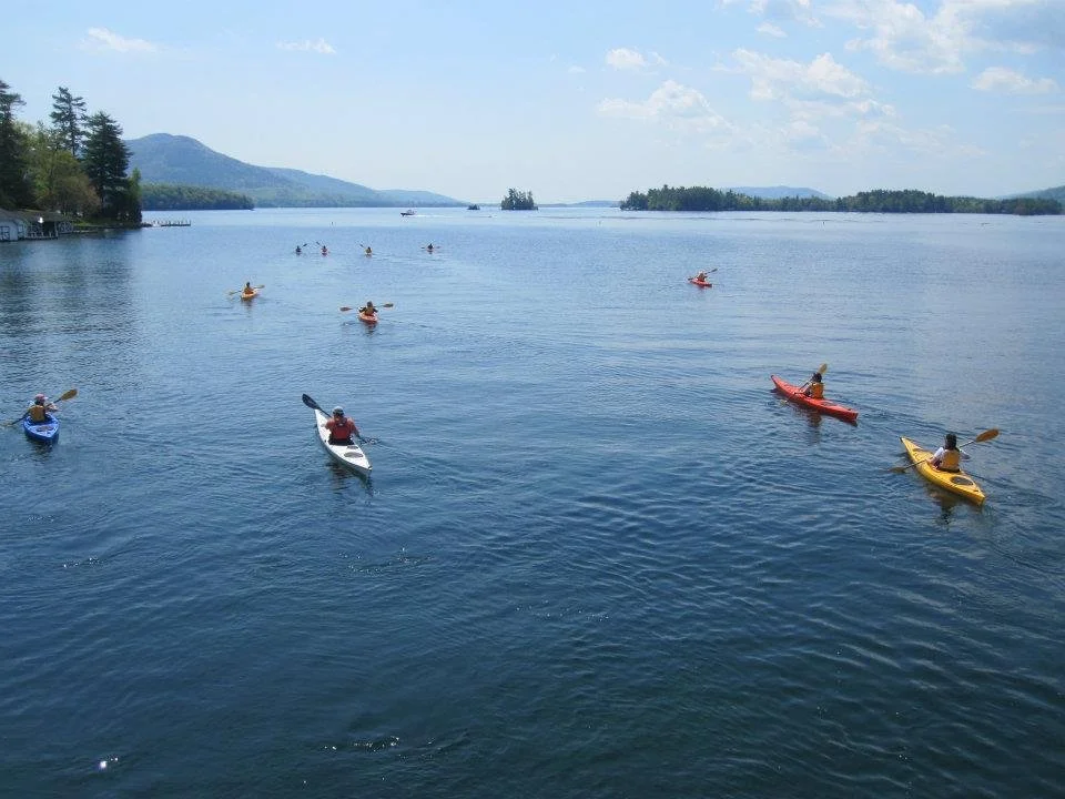 Group of kayakers on an Adirondack Lake.