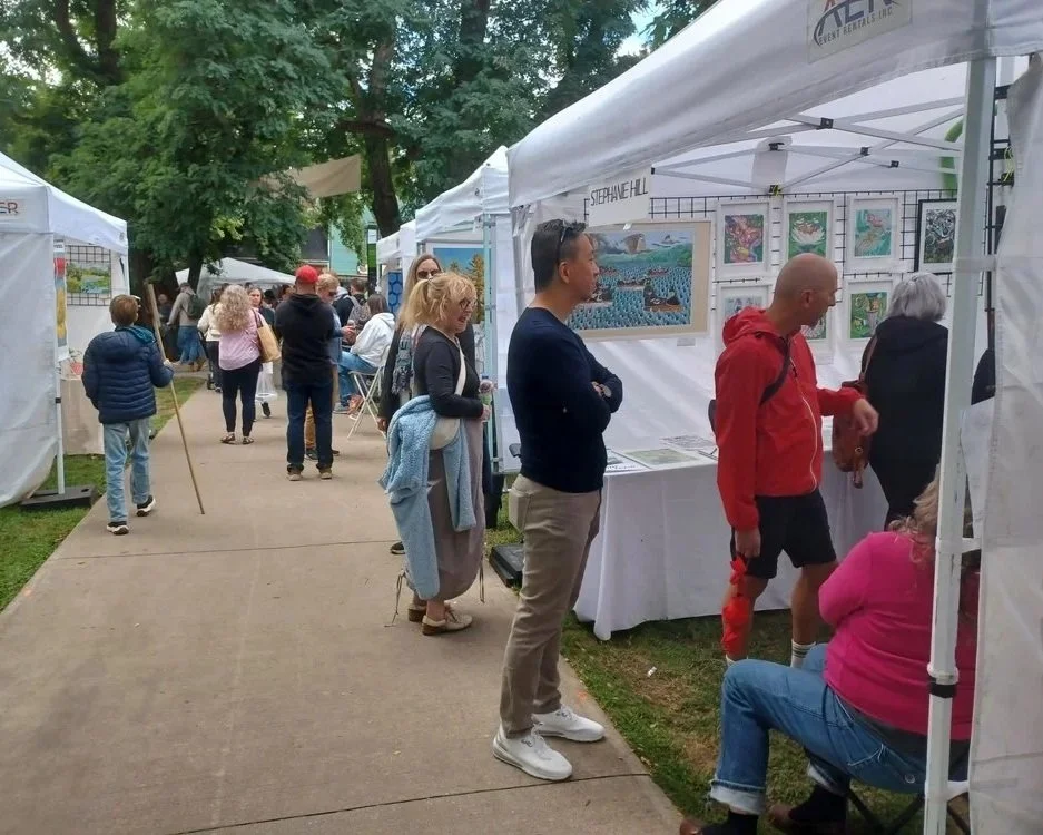 Arts displaying their work at an Art Festival.