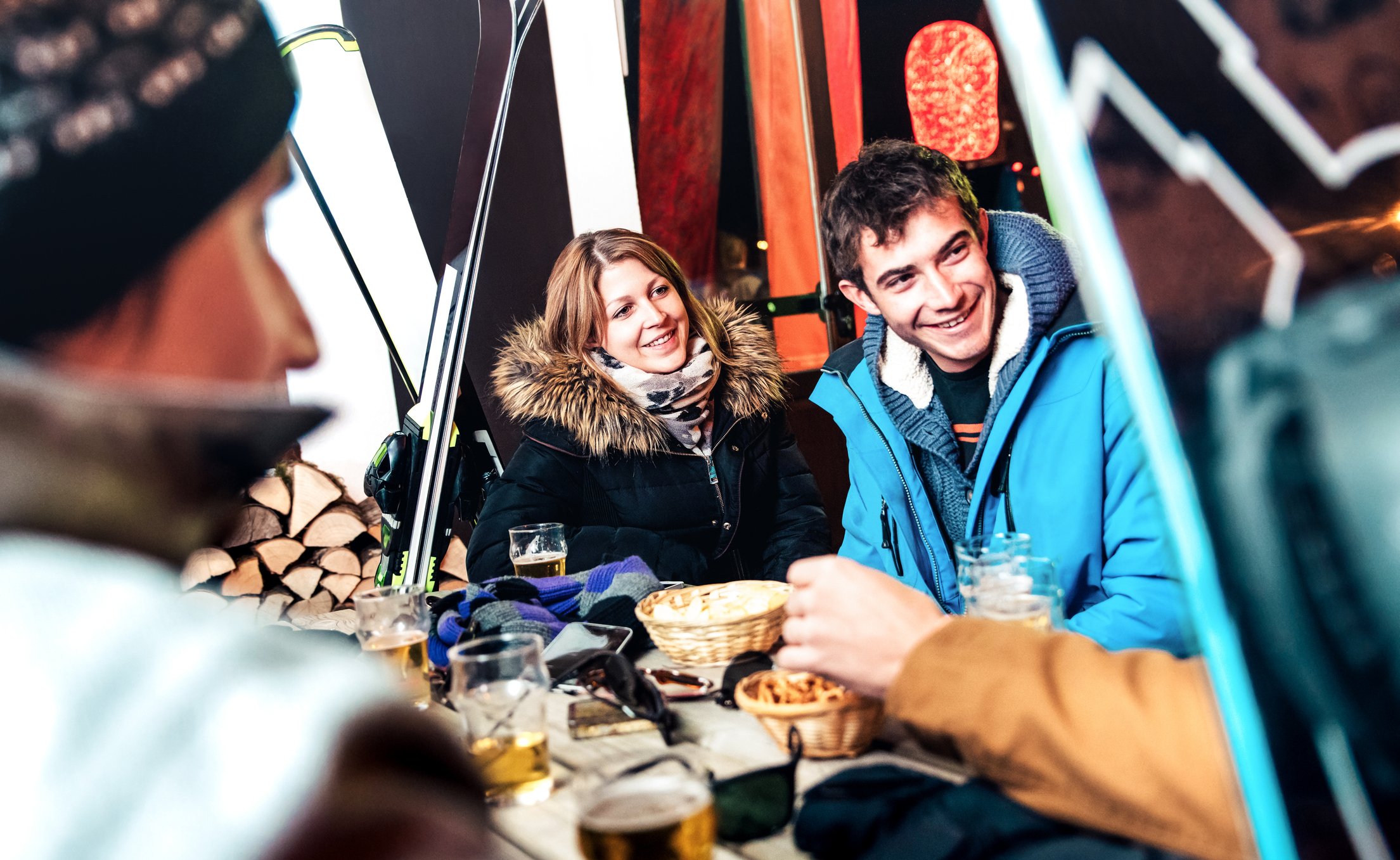 People enjoying apres ski beverages, food and live music at Gore Mountain.