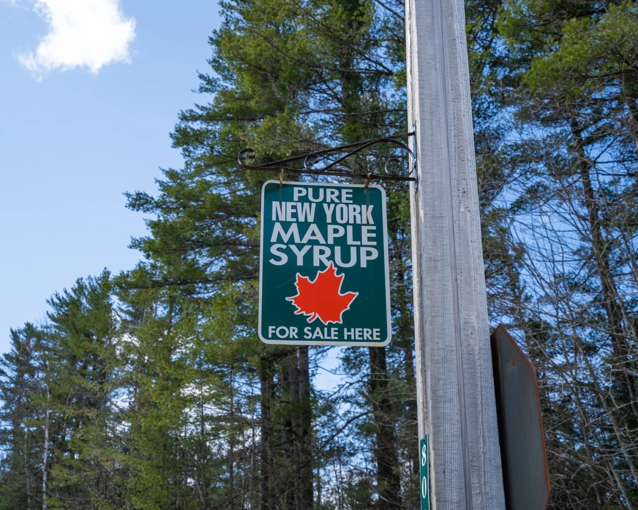 Banner promoting pure New York maple syrup made in places like Thurman, NY, in the Adirondacks.