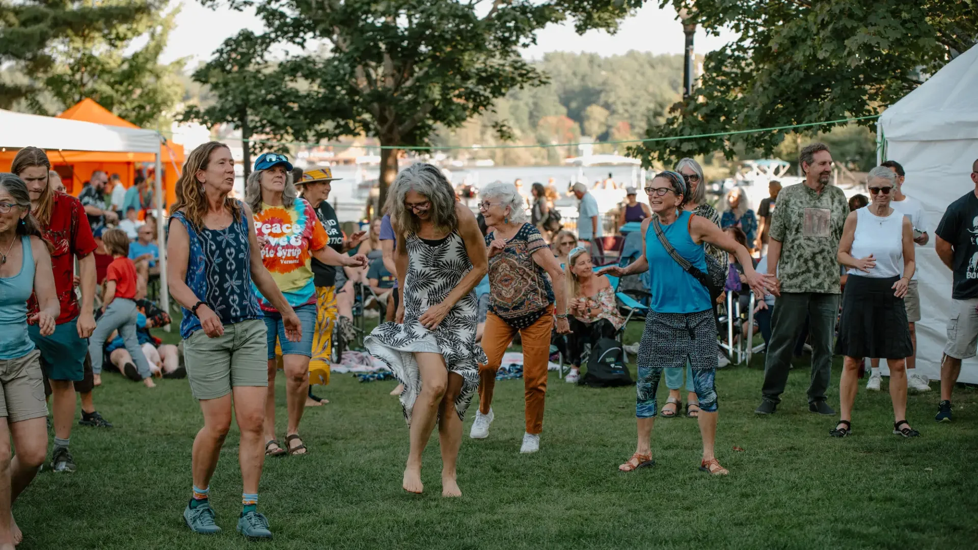 People Dancing to live music at annual labor day music festival event.