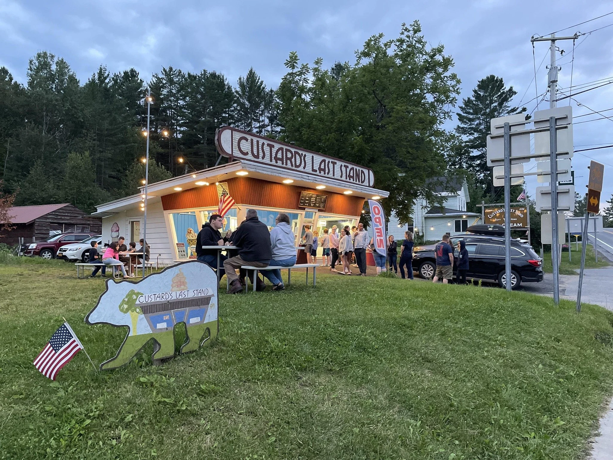 People hanging out and enjoying ice cream treats in Long Lake in the Adirondacks.