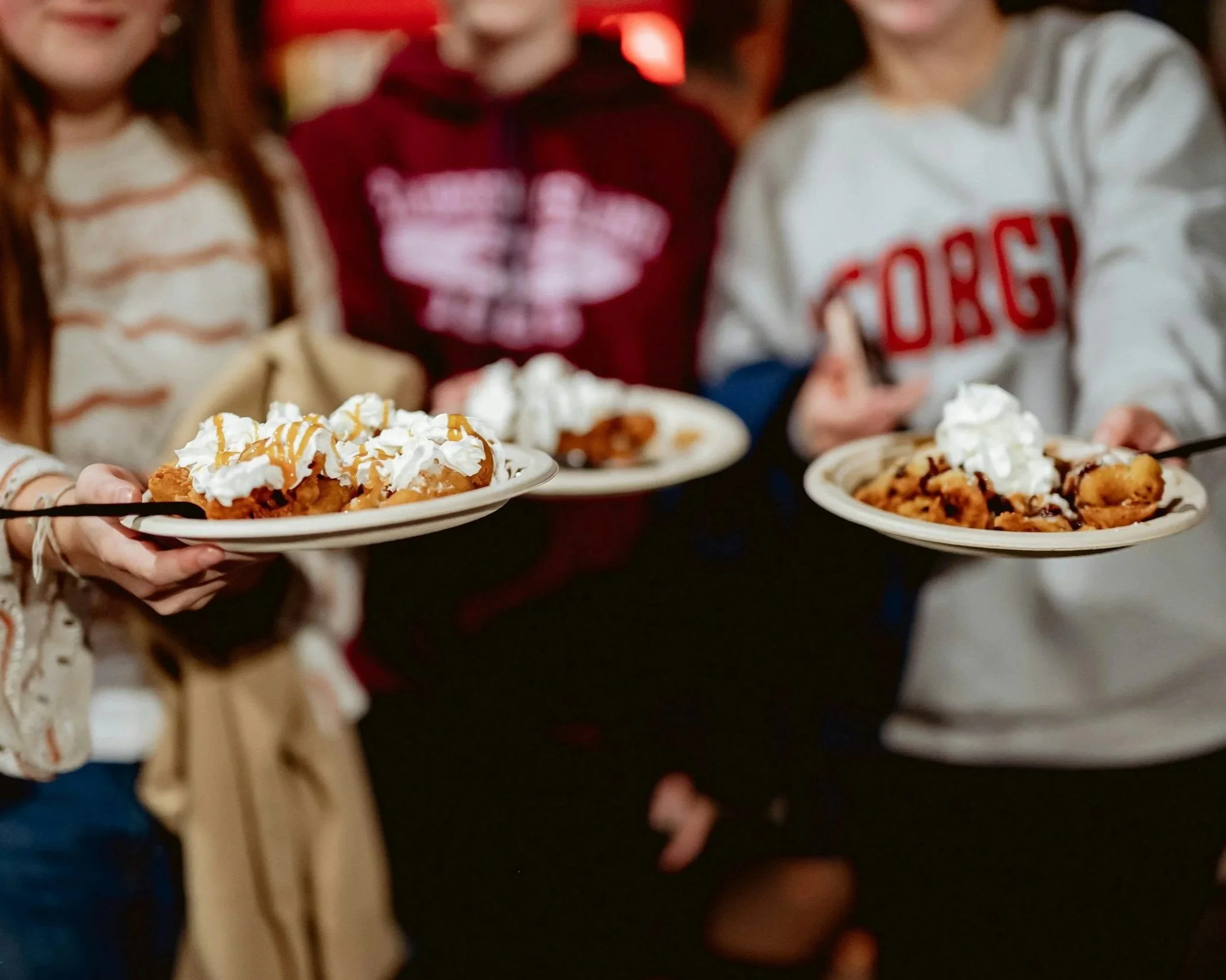 Waffles with maple syrup and whipped cream at Hadley Maple in April Festival.