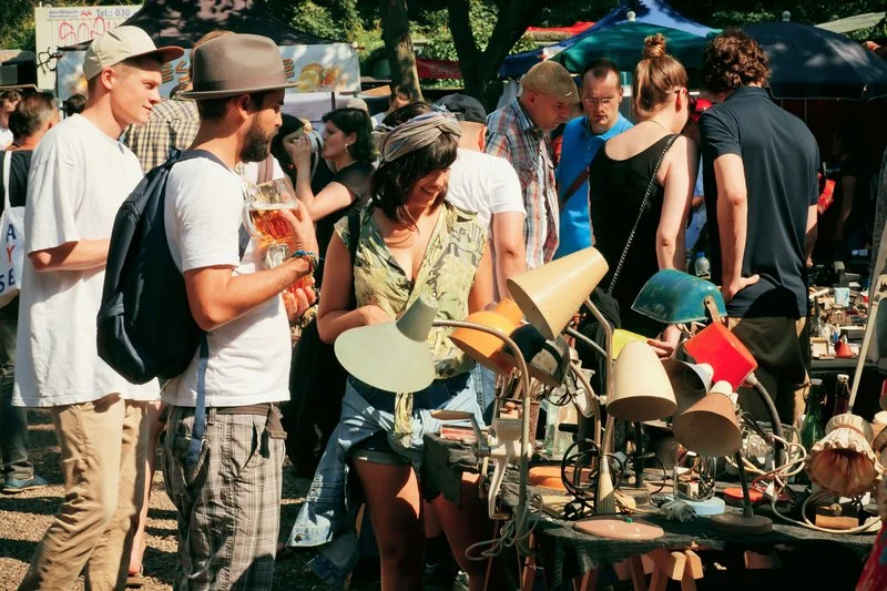 People shopping for antiques and vintage items at the Great Adirondack Garage Sale in the Adirondacks.