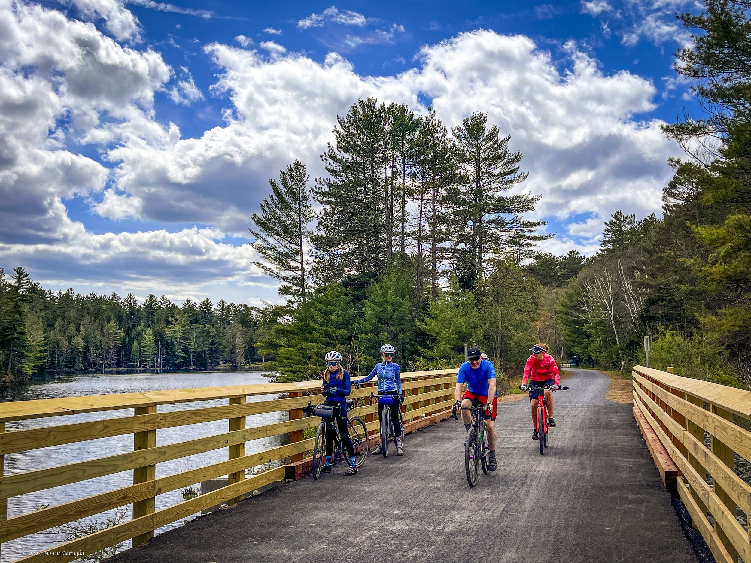 Cyclists on the Rail Trail on a guided tour by Bike ADK