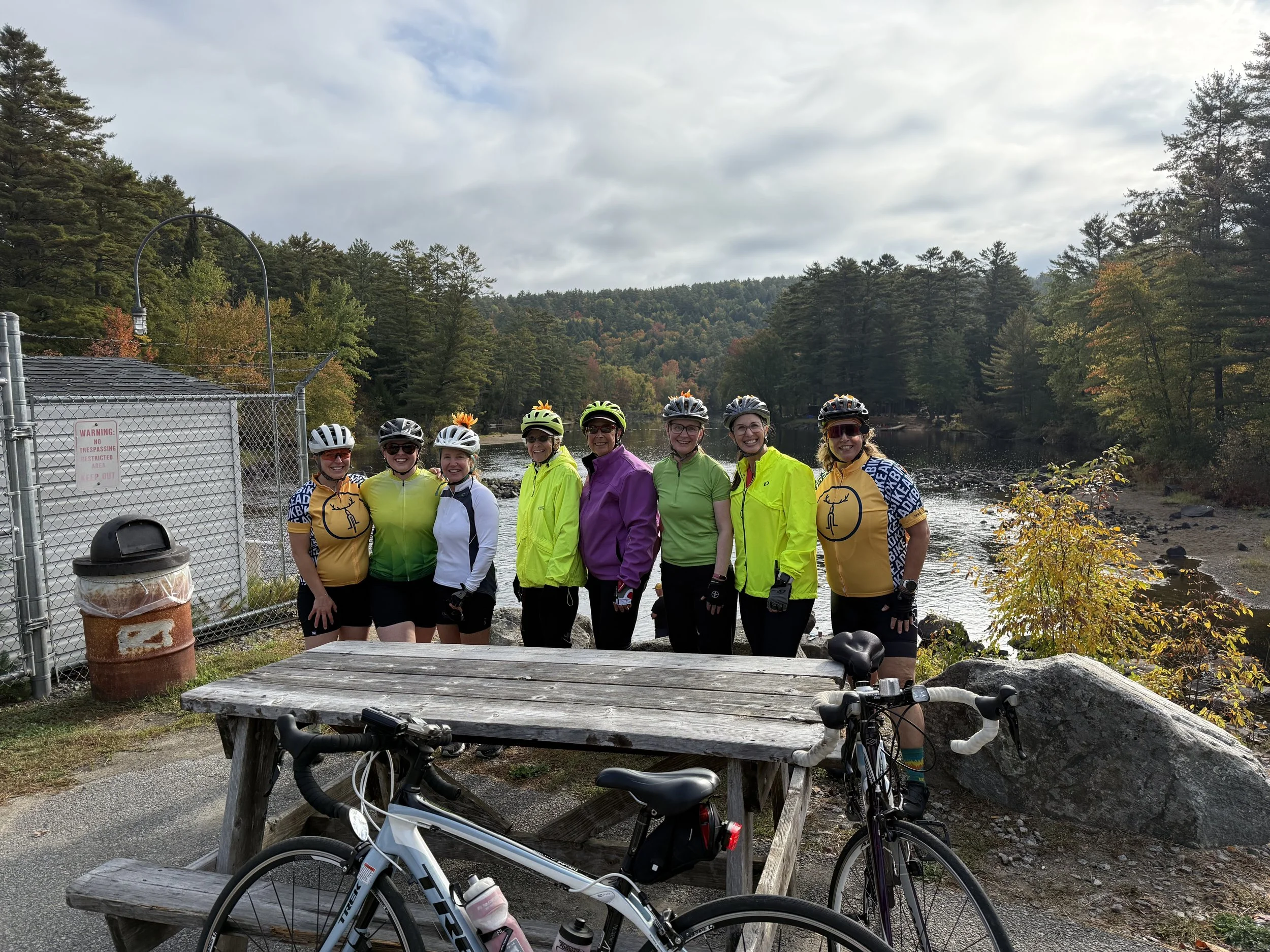 Women biking together during BikeADK's Women's Weekend.