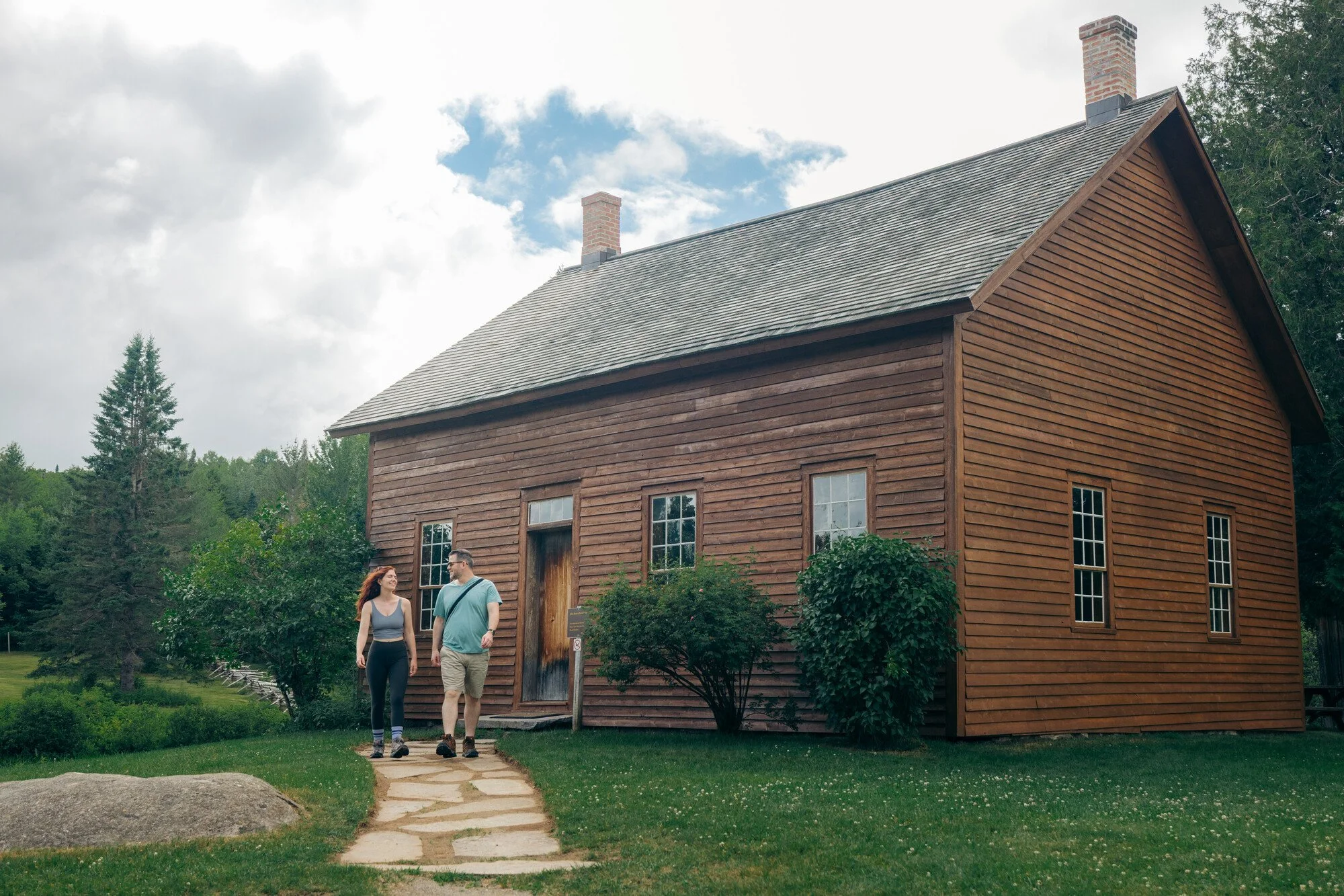visitors exploring the grounds of John Brown Farm near Lake Placid, NY.