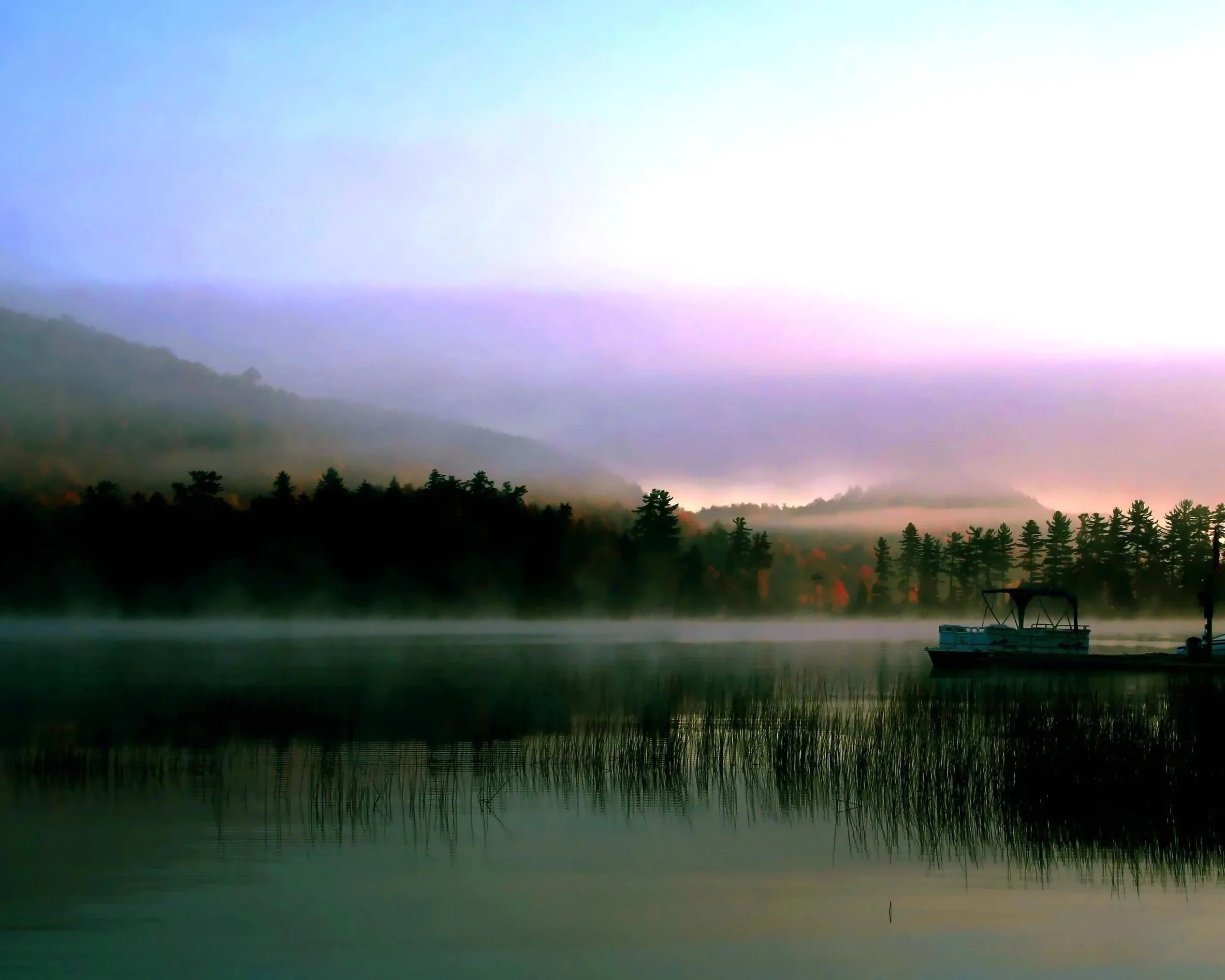 A haunting image of Big Moose Lake in the Adirondacks, site of the murder of Grace Brown.