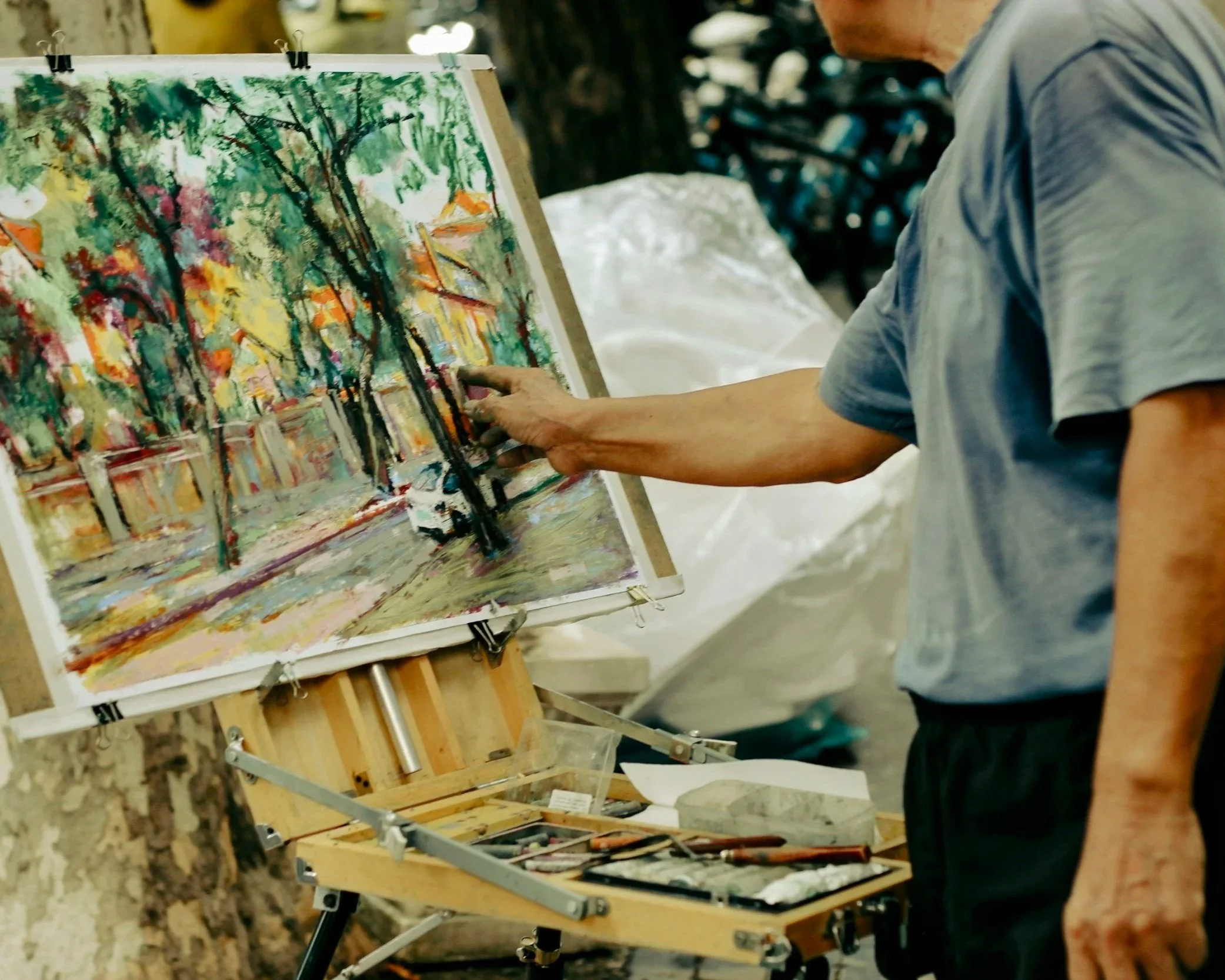 Man painting at Glens Falls Plein Air Festival
