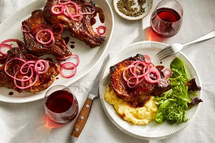 Photo of Air Fryer Pork Chops with Maple-Soy Glaze from Food & Wine Magazine.