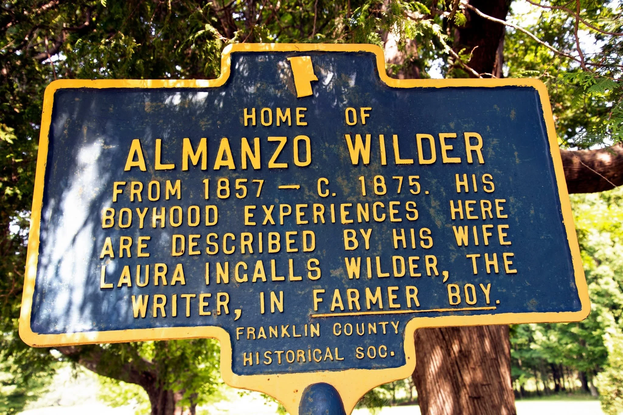 Historic marker for the Almanzo Wilder Homestead in Franklin County, NY.