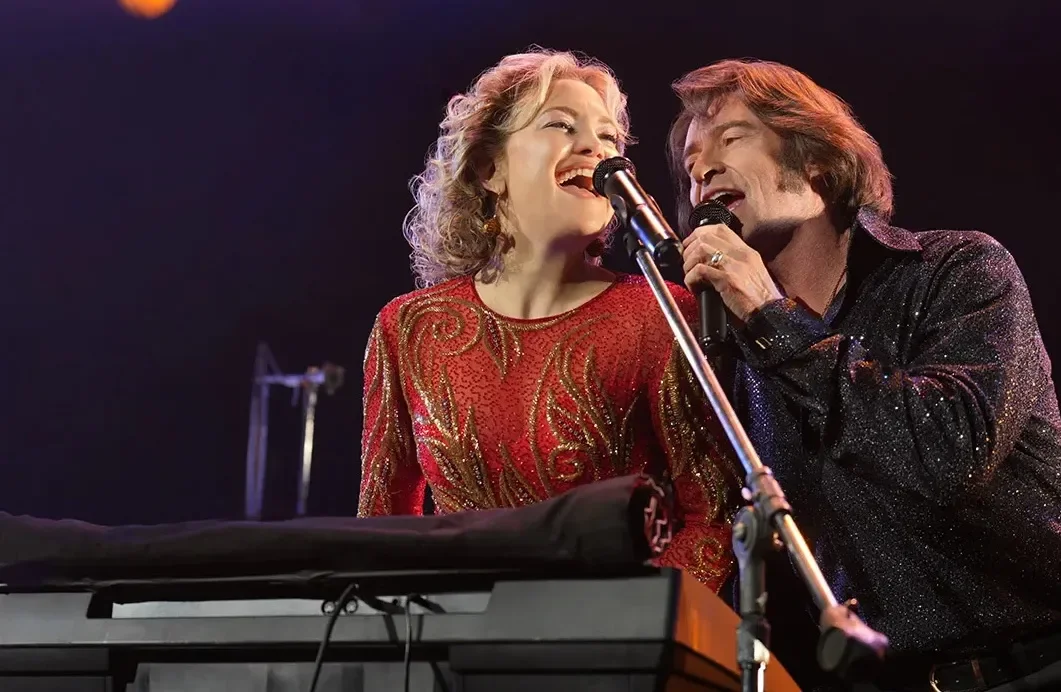 Kate Hudson and Hugh Jackman performing Neil Diamond's music in Song Sung Blue.