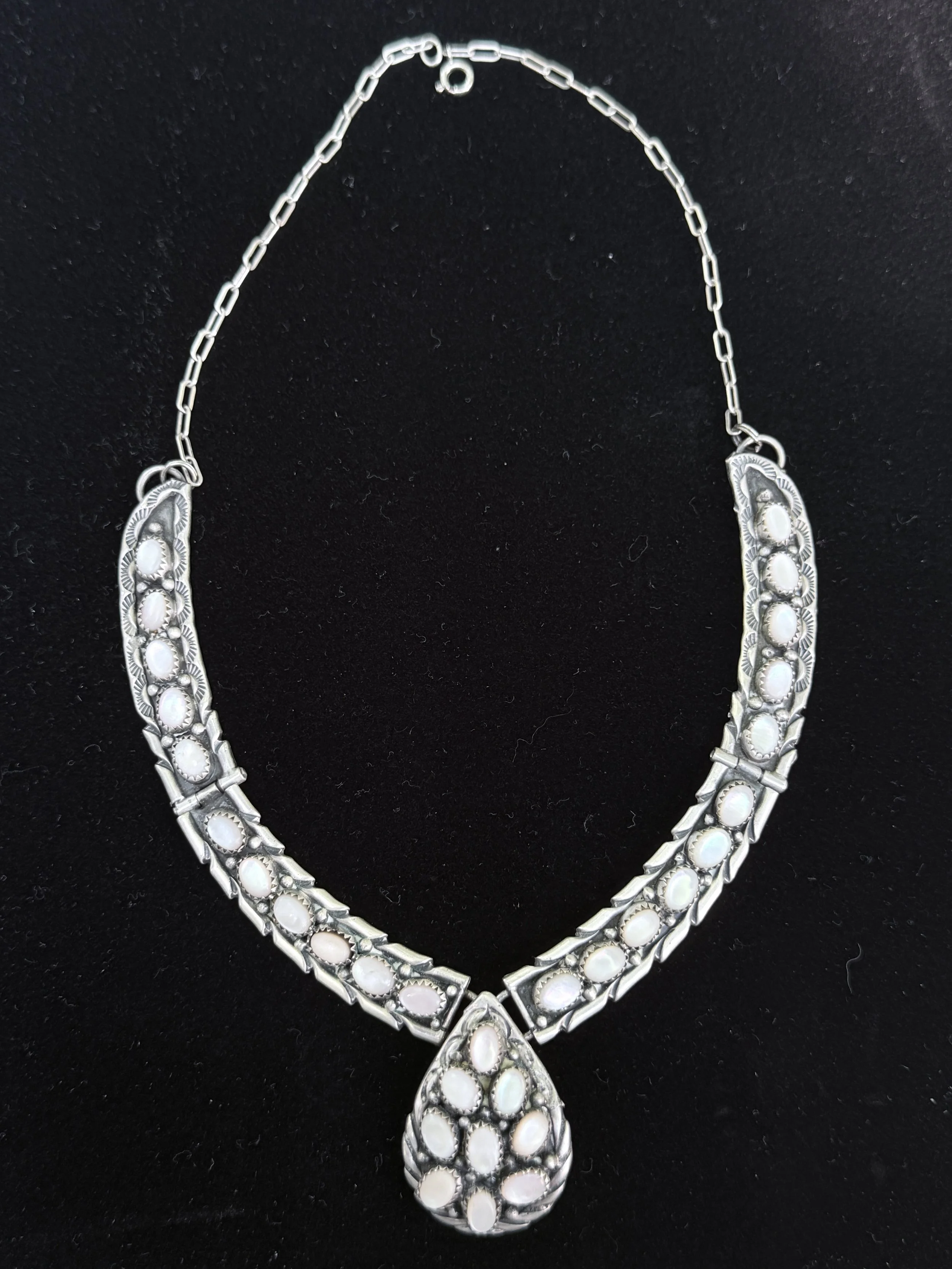 Edward Becenti Mother of Pearl Hinged Choker Necklace
Sterling silver,  Mother of Pearl
Signed EB, Sterling
Navajo
