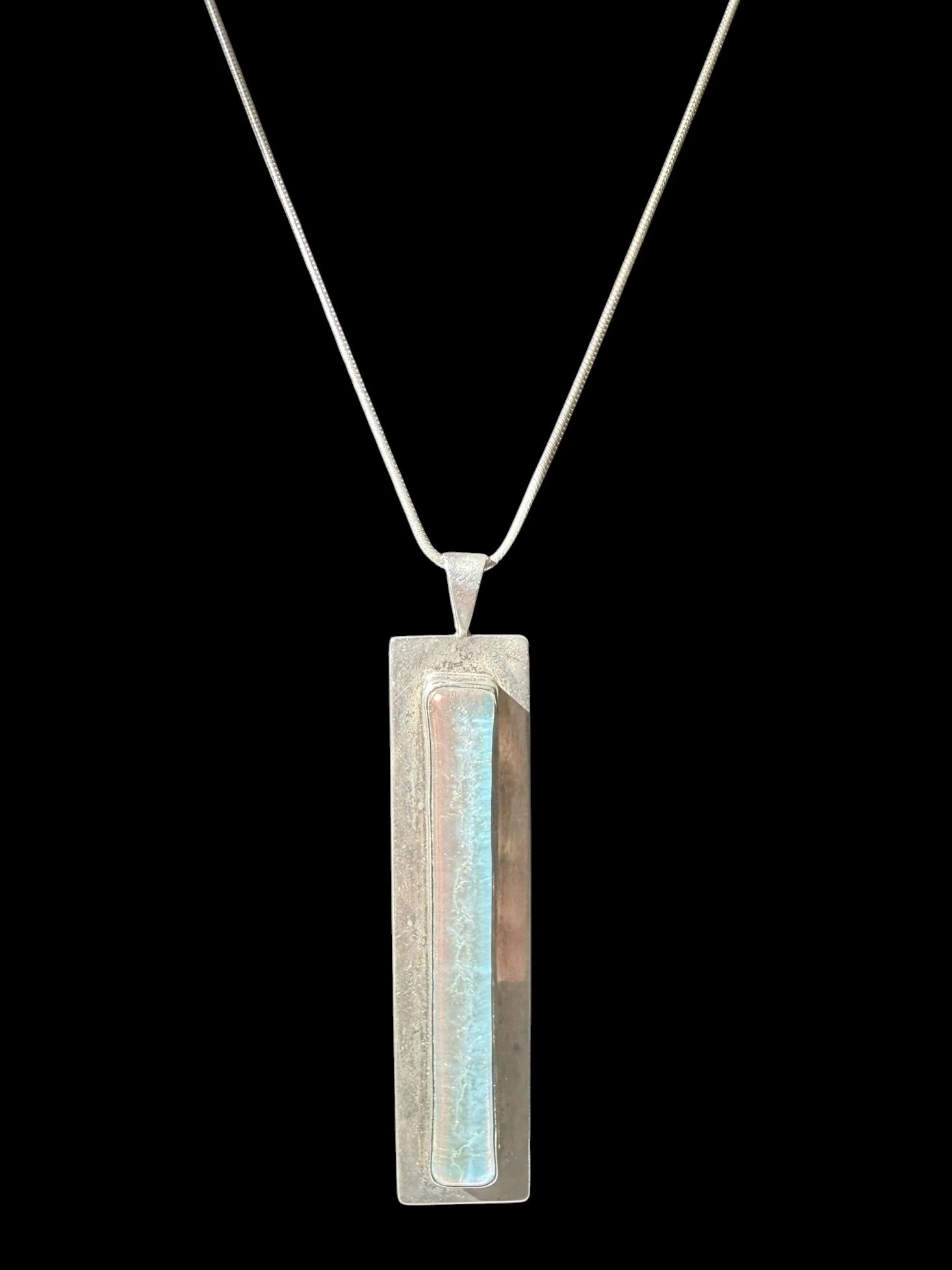 Debra Wayne, sterling silver and dichroic glass pendant, c. 1992 — $175
