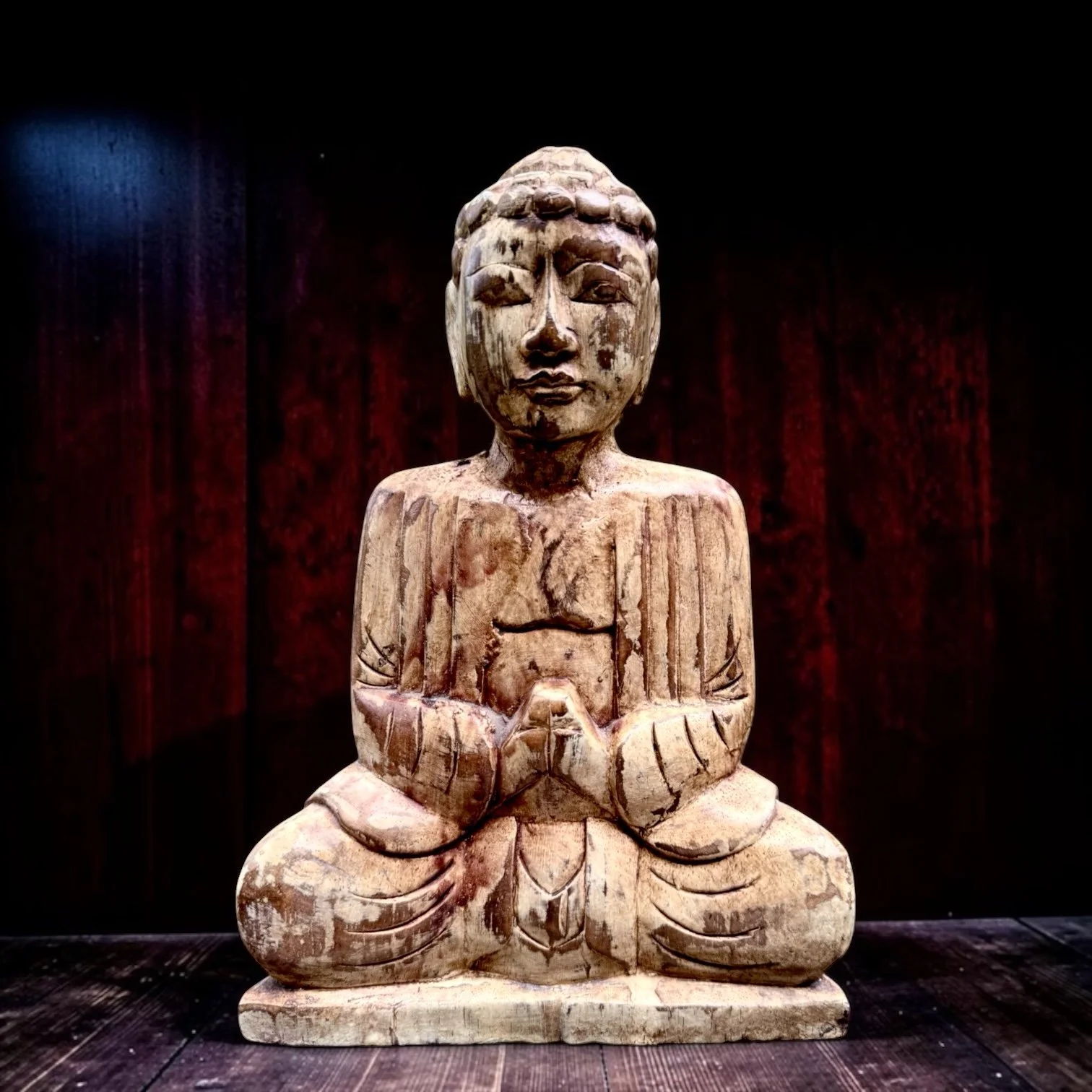 Antique Southeast Asian Carved Wood Buddha Architectural Fragment
Southeast Asian, circa 1900, hand-carved wood, seated Buddha with weathered painted surface, architectural salvage with three original mounting holes underneath, 9.5" H × 6.5" W × 2.5"