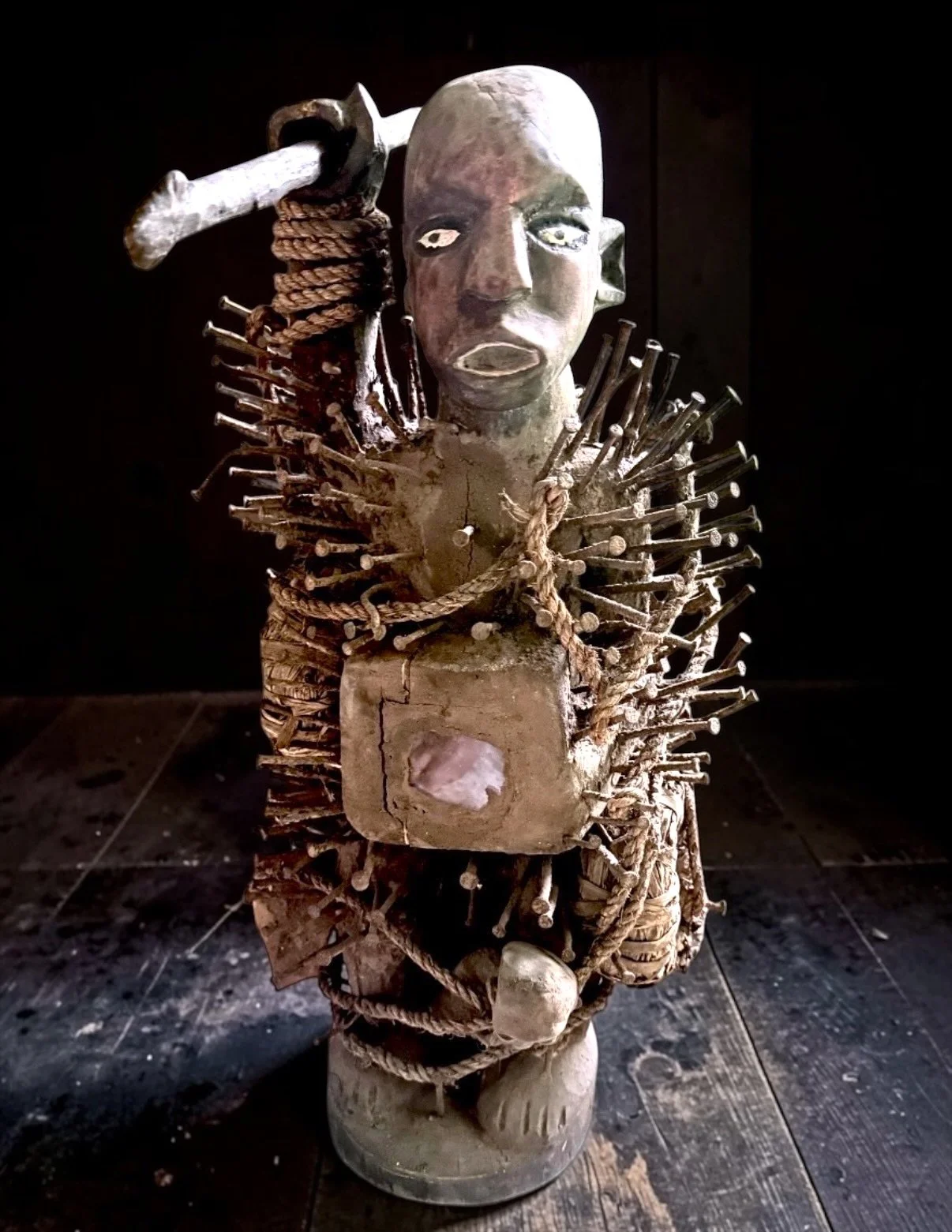 Statue in the style of Kongo Nkisi Power FIgure
Congo, mid- late- 20th c.
Wood, iron, fiber, clay, glass, ritual elements
26" h x 8" w