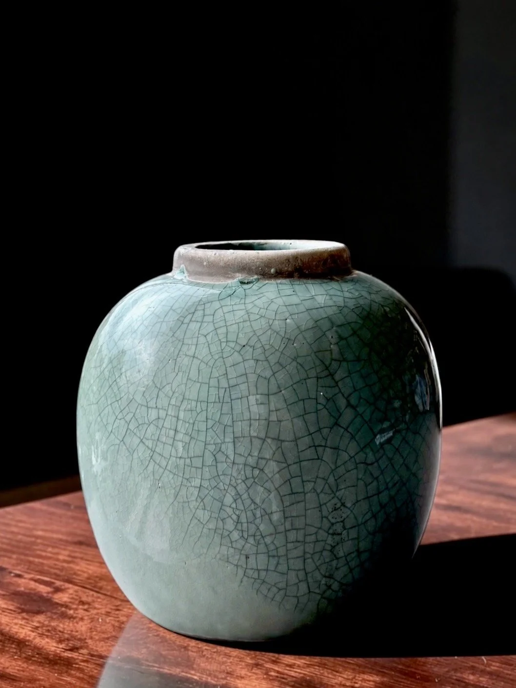 BRYNXZ Celadon Craquelé Vessel
Dutch interiors brand BRYNXZ
Contemporary, glazed ceramic, Celadon green, crackle finish, textured rim, marked BRYNXZ on base, approximately 8″ high
Sourced in Haarlem, The Netherlands
 $75