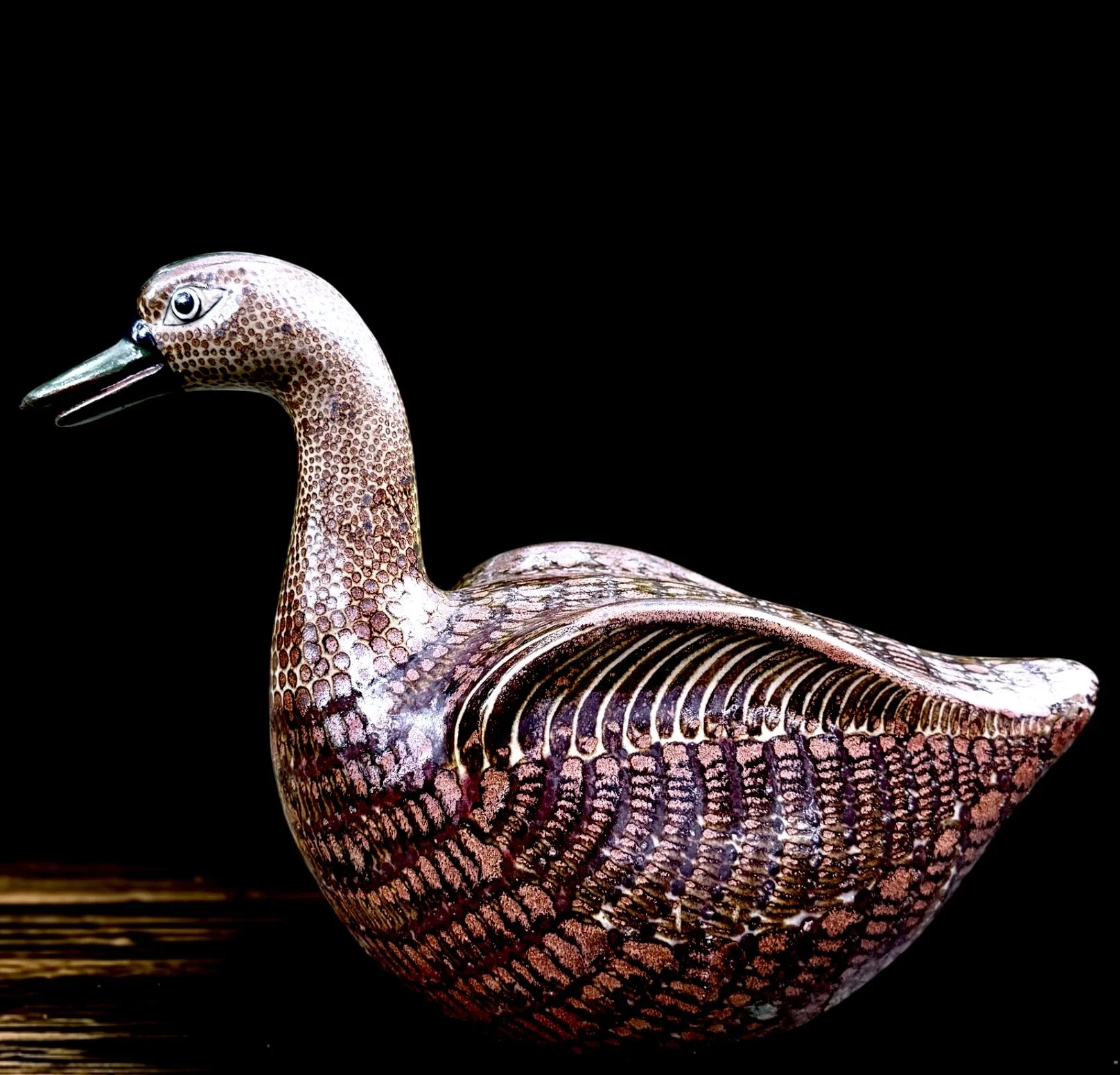 Large studio handmade ceramic duck
Unsigned
Sculpted in one piece from a wheel thrown object, attached sculpted neck. 
Exquisite mottled and varied glazed surface commiserate with reduction firing 
18"l. Excellent condition.