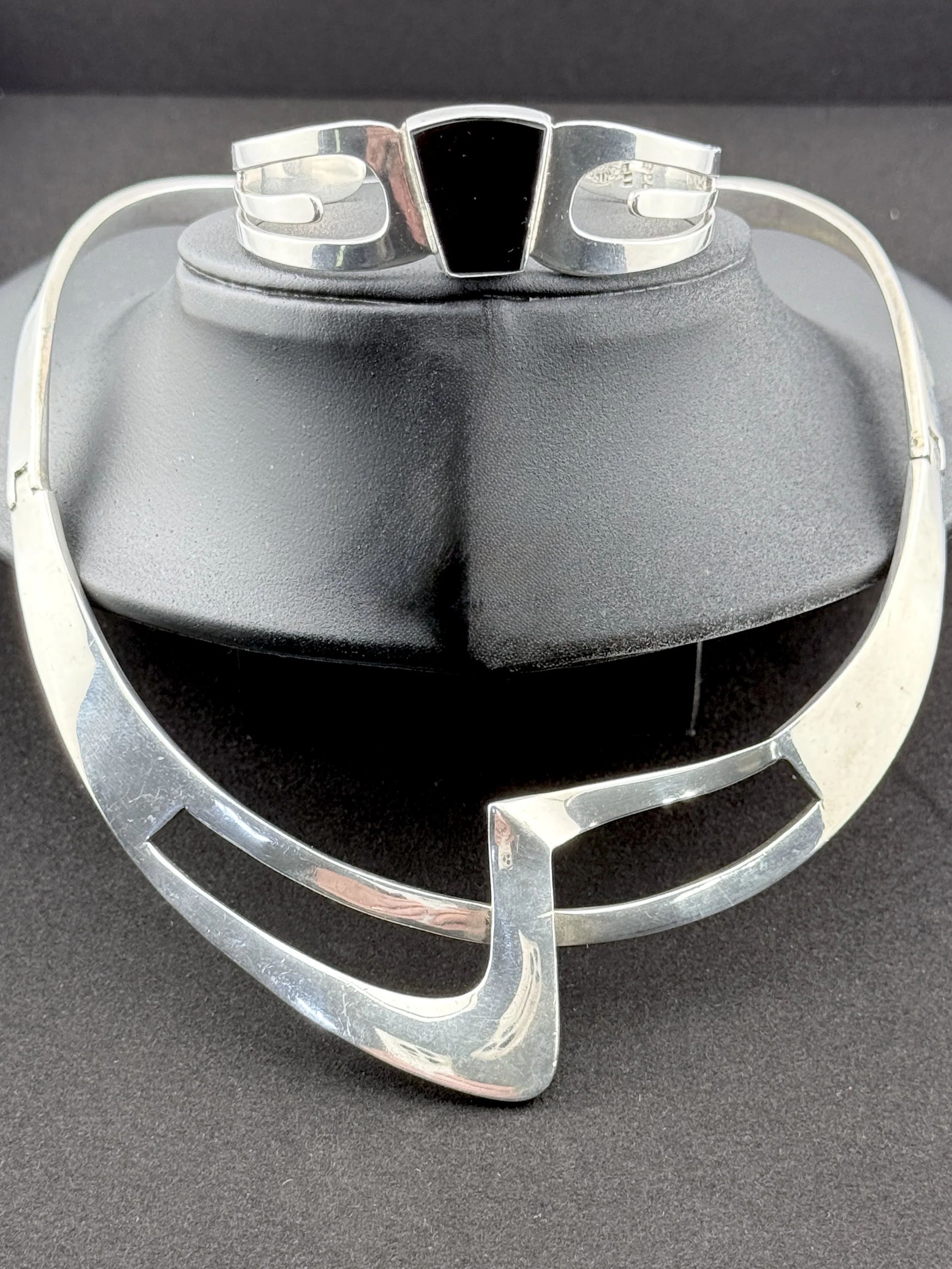 Taxco sterling silver modernist hinged collar, c. 1970s — $550
Taxco sterling silver cuff, signed Luna, black onyx inlay, c. 1970s — $265