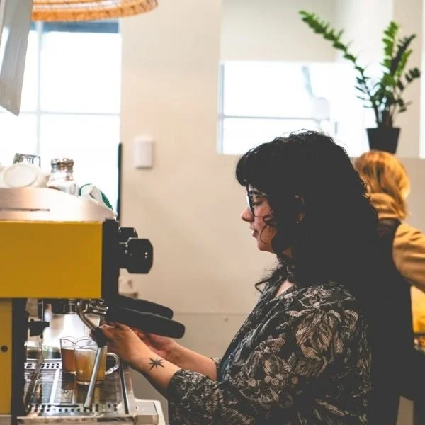 Barista pulling espresso shots in Olympia