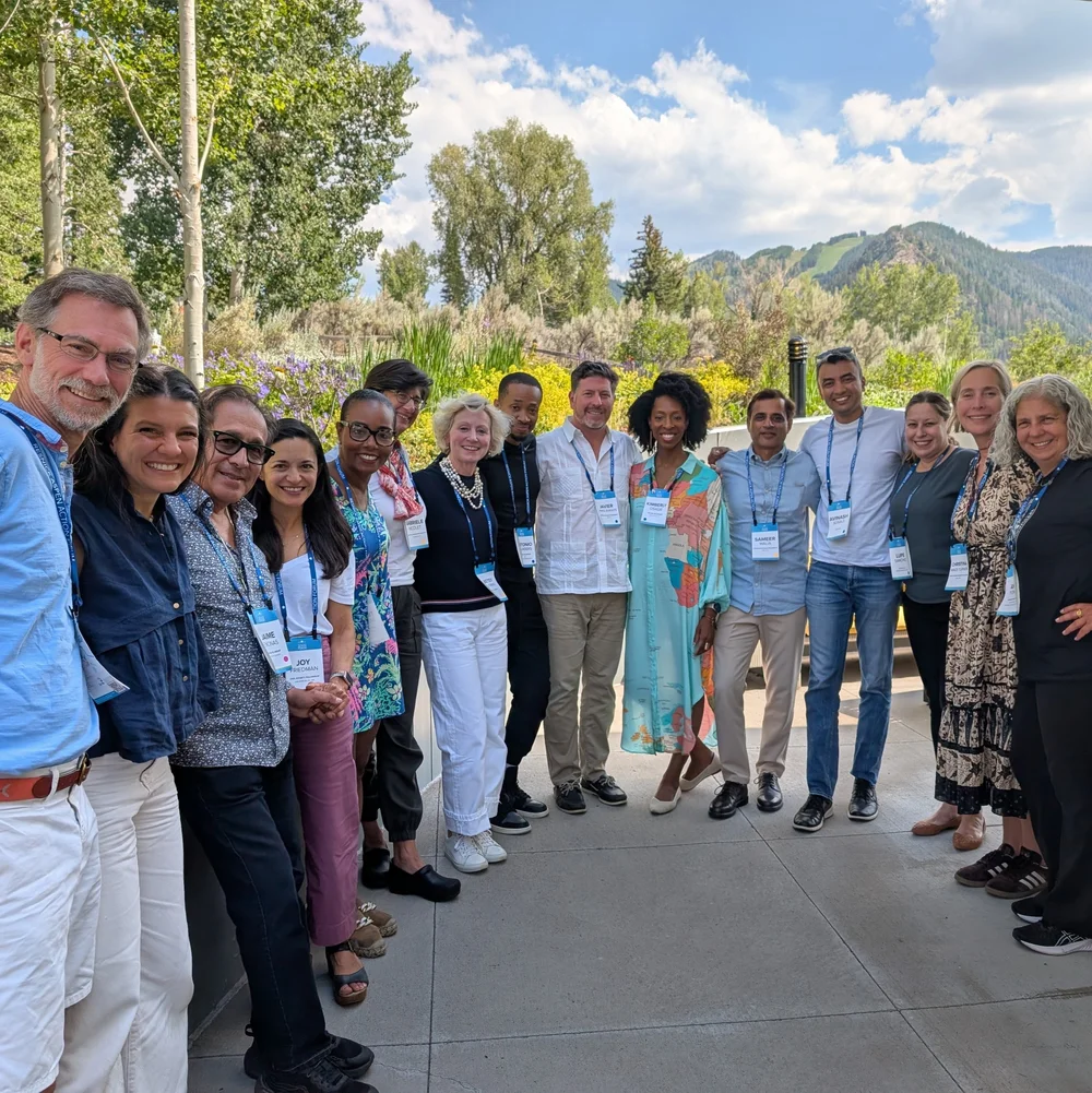 resnick-aspen-action-forum-2025_delegate-circle_outdoor-group-photo.jpg