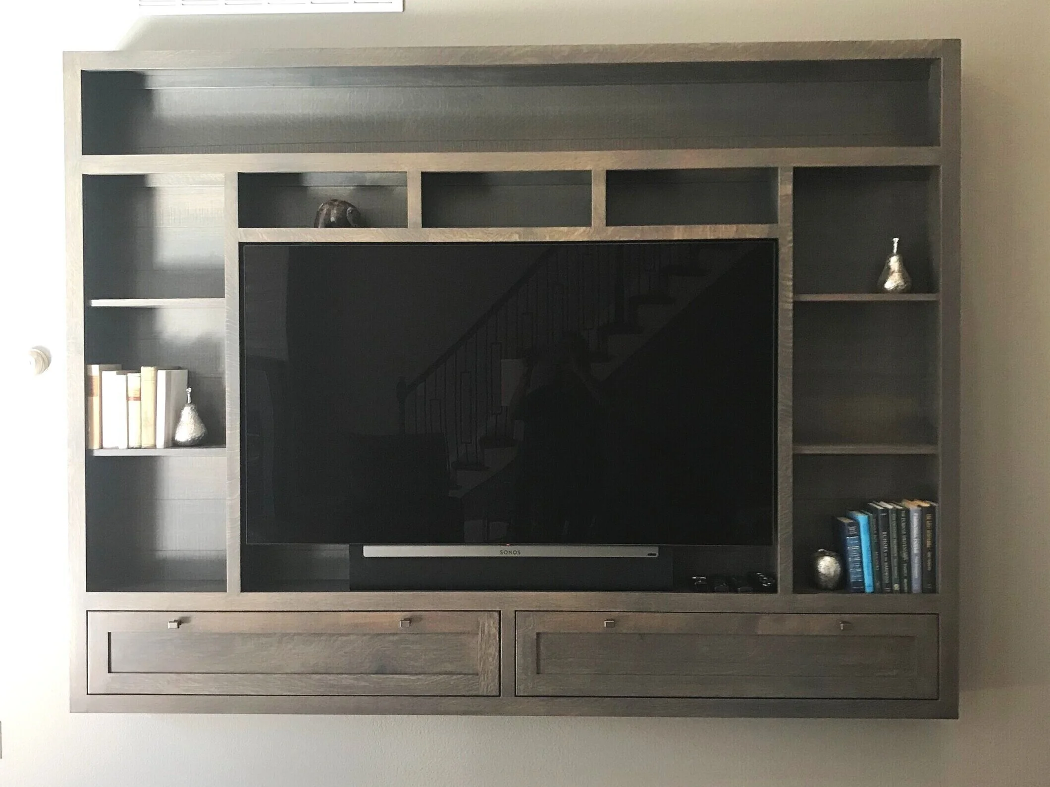built-in shelving around tv