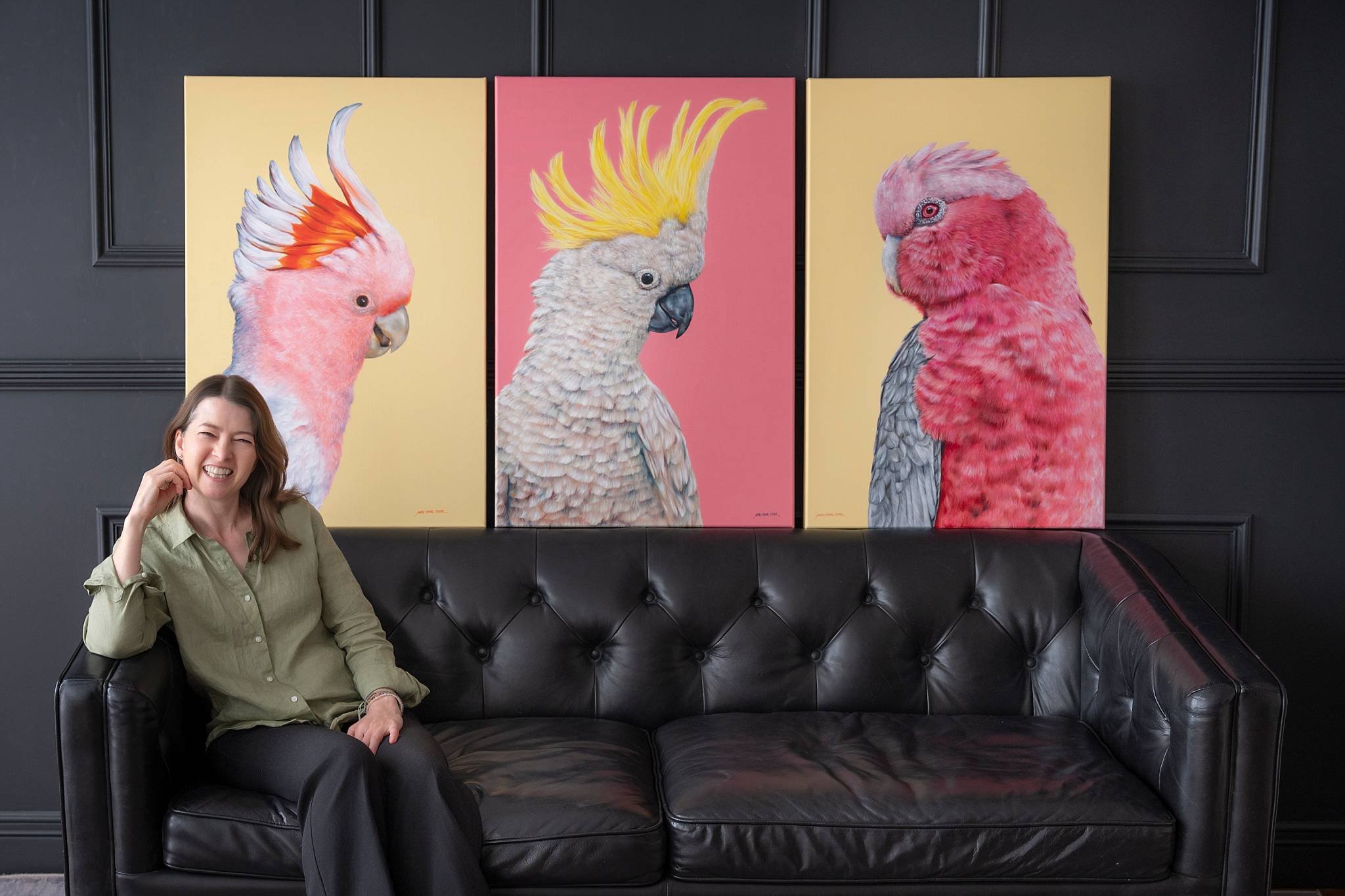 Artist Marie-Claire Colyer with her painted Portrait series_WEB.jpg