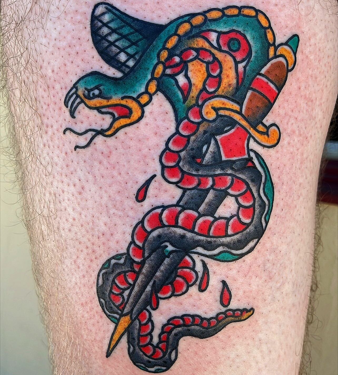 Heres a snake and dagger @kd1904 made on Nash over the weekend here at the shop!  Nash, sat like a champ!  Thank you!  More American Traditional please!  Clementinetattoo.com #clementinetattoo #clementine #sandiegotattooartist #sandiegotattooshop #sa
