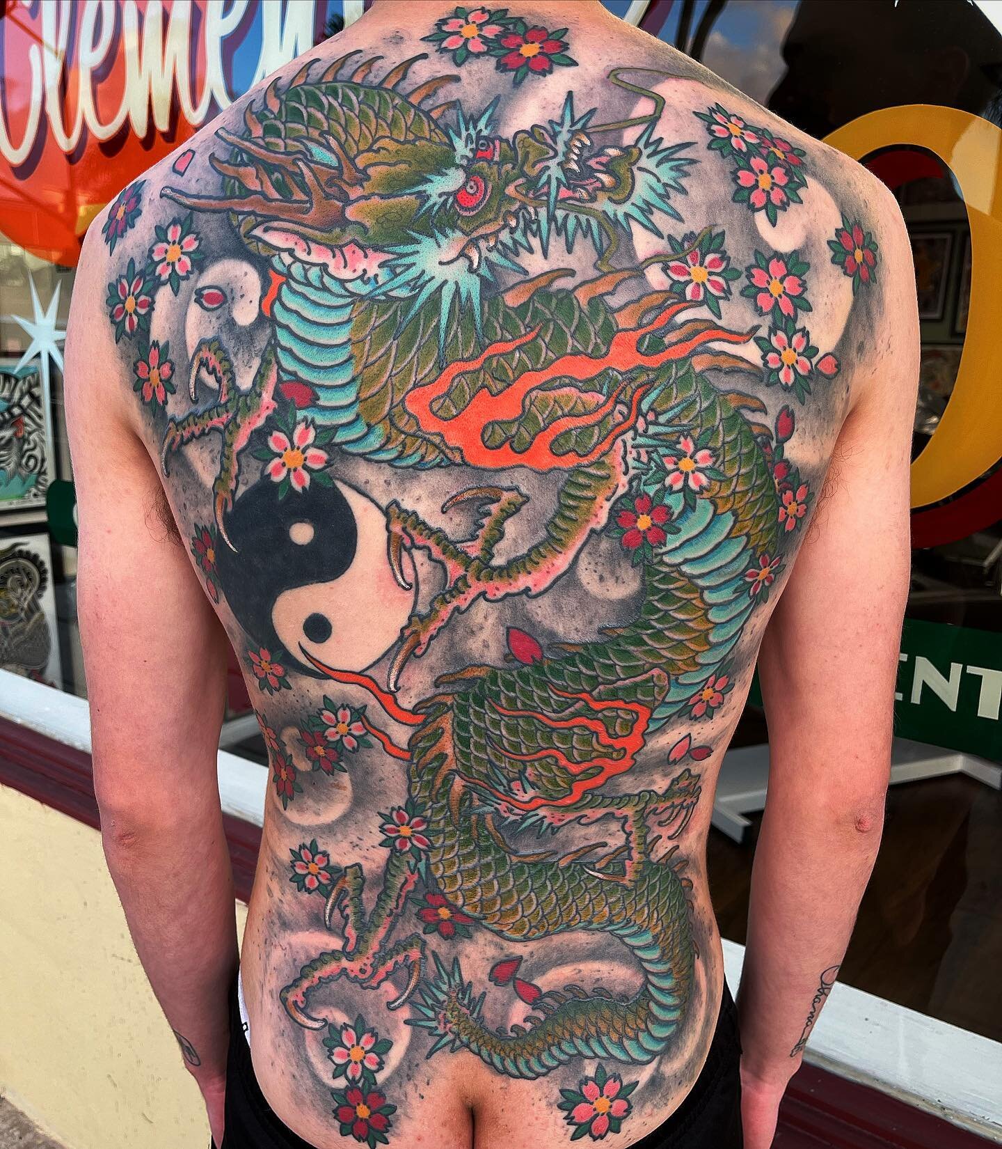 Here&rsquo;s a one off Japanese dragon and blossom backpiece @kd1904 finished up over the weekend on Jonathan.  Kurt loves to do Japanese styled large scale tattoos! Come get one! clementinetattoo.com #clementinetattoo #clementine #sandiegotattooshop