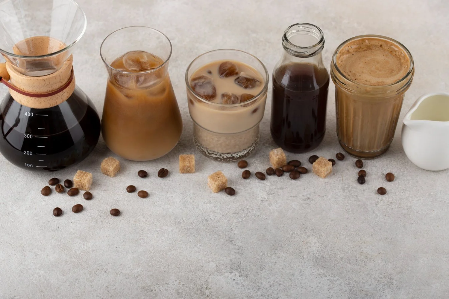 row of various coffees including hot chemex and iced cold brew