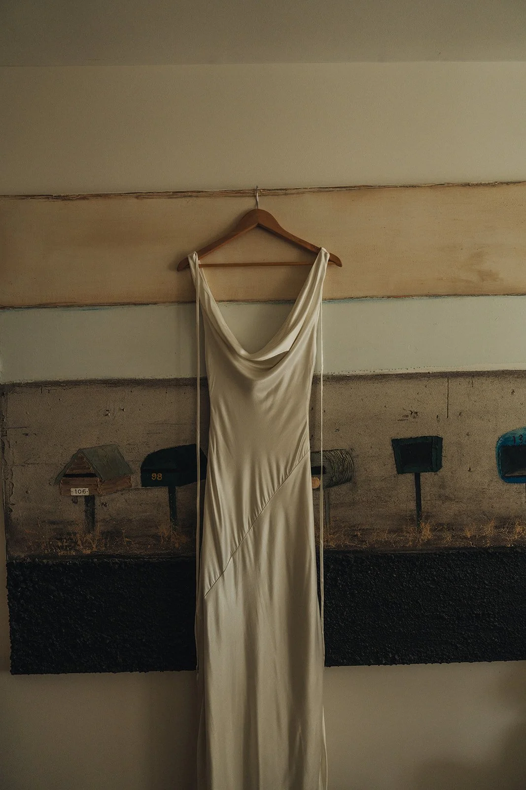 The bride’s second dress photographed in shadow at Krinklewood Estate, a quiet transition into the evening.