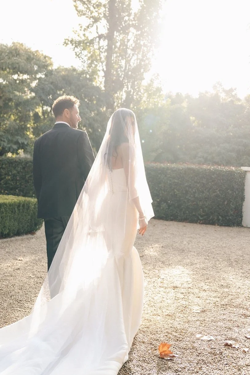 Couple walking together following a Hunter Valley wedding at Redleaf Wollombi