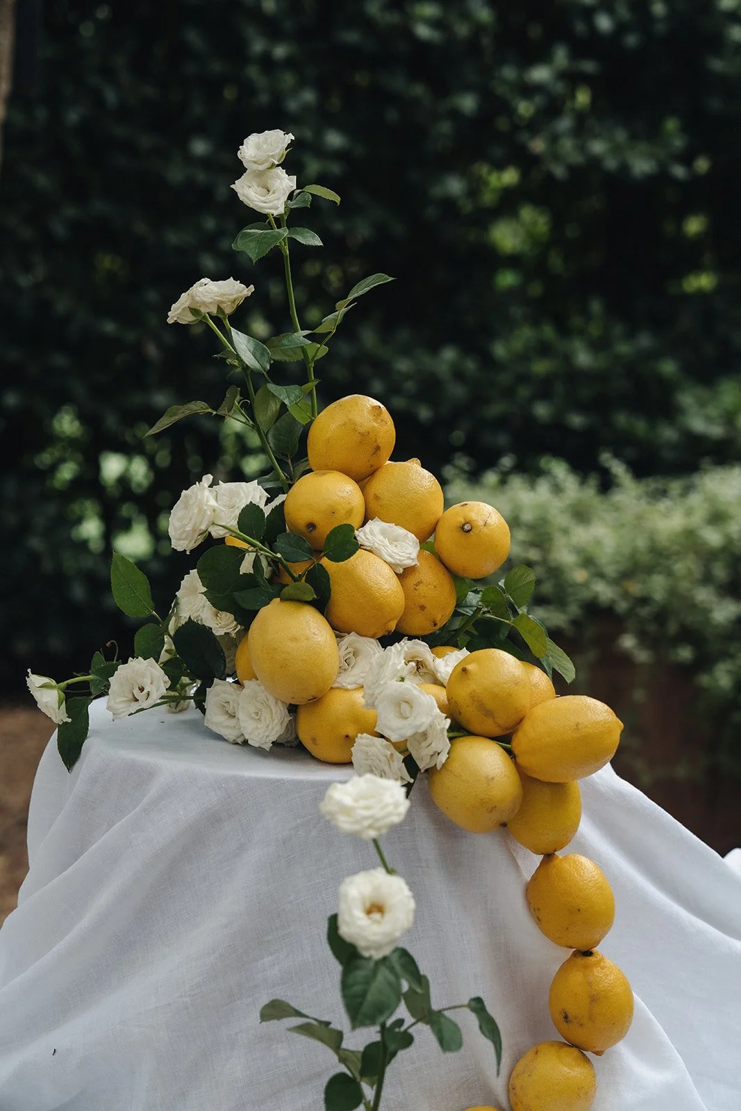 Cocktail hour styling at Krinklewood Estate, with citrus details and a margarita tower set among the gardens.