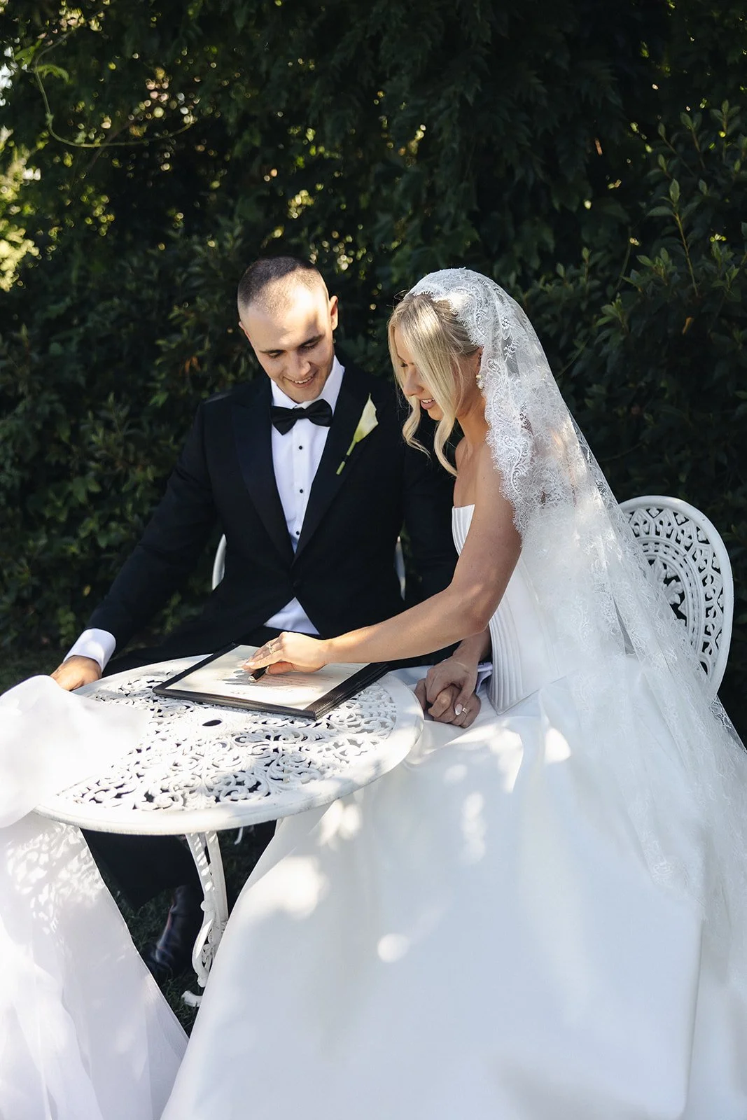 Bride and groom signing the marriage registry at Albion Farm in the Hunter Valley